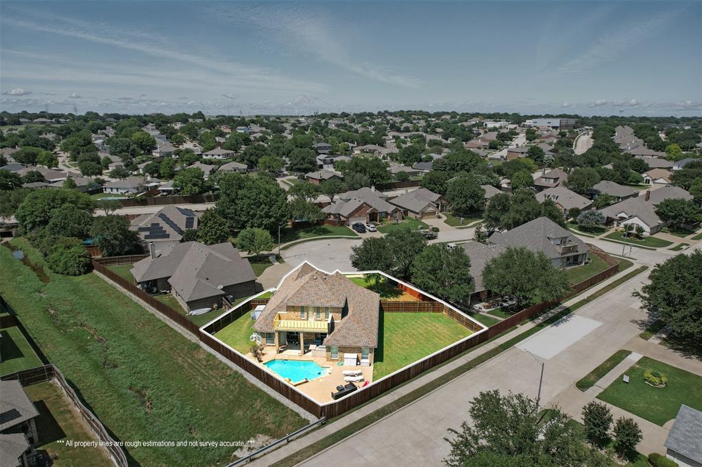 10717 Greenview Court Benbrook, TX 76126 - Photo 30 of 36 an aerial view of residential houses with outdoor space
