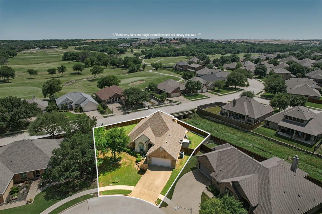 10717 Greenview Court Benbrook, TX 76126 - Photo 31 of 36 an aerial view of a house with a garden