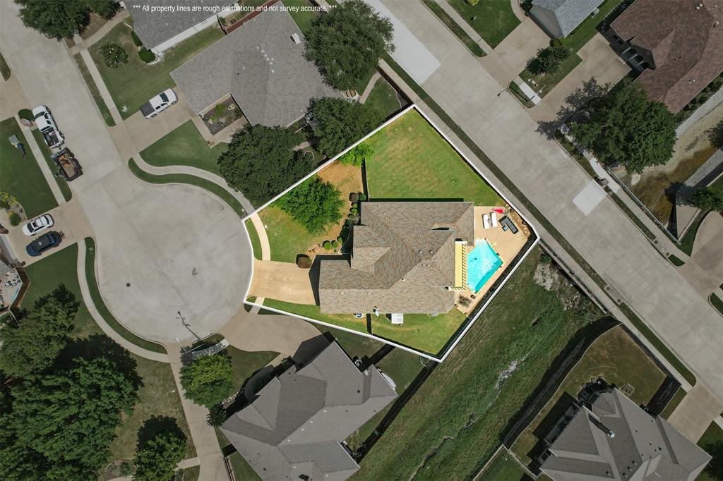 10717 Greenview Court Benbrook, TX 76126 - Photo 32 of 36 an aerial view of a house with a swimming pool