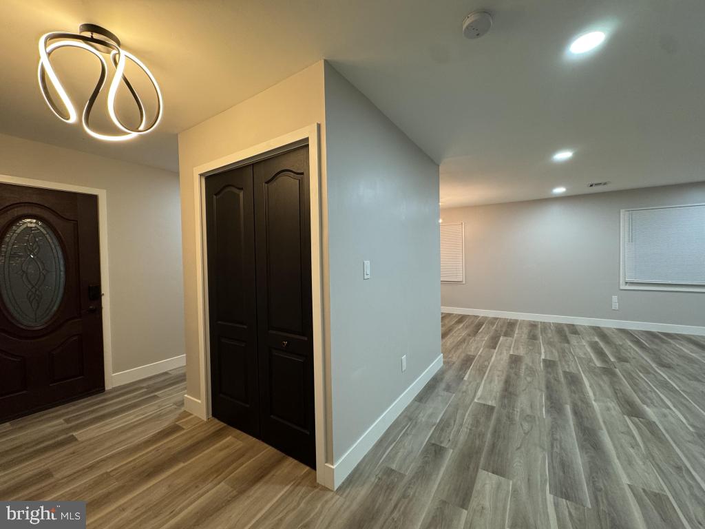 24 Pilgrim Lane Willingboro, NJ 08046 - Photo 13 of 31 a view of empty room with wooden floor and fan