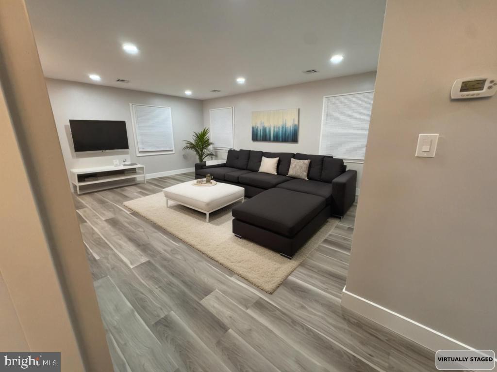 24 Pilgrim Lane Willingboro, NJ 08046 - Photo 15 of 31 a living room with furniture and a flat screen tv
