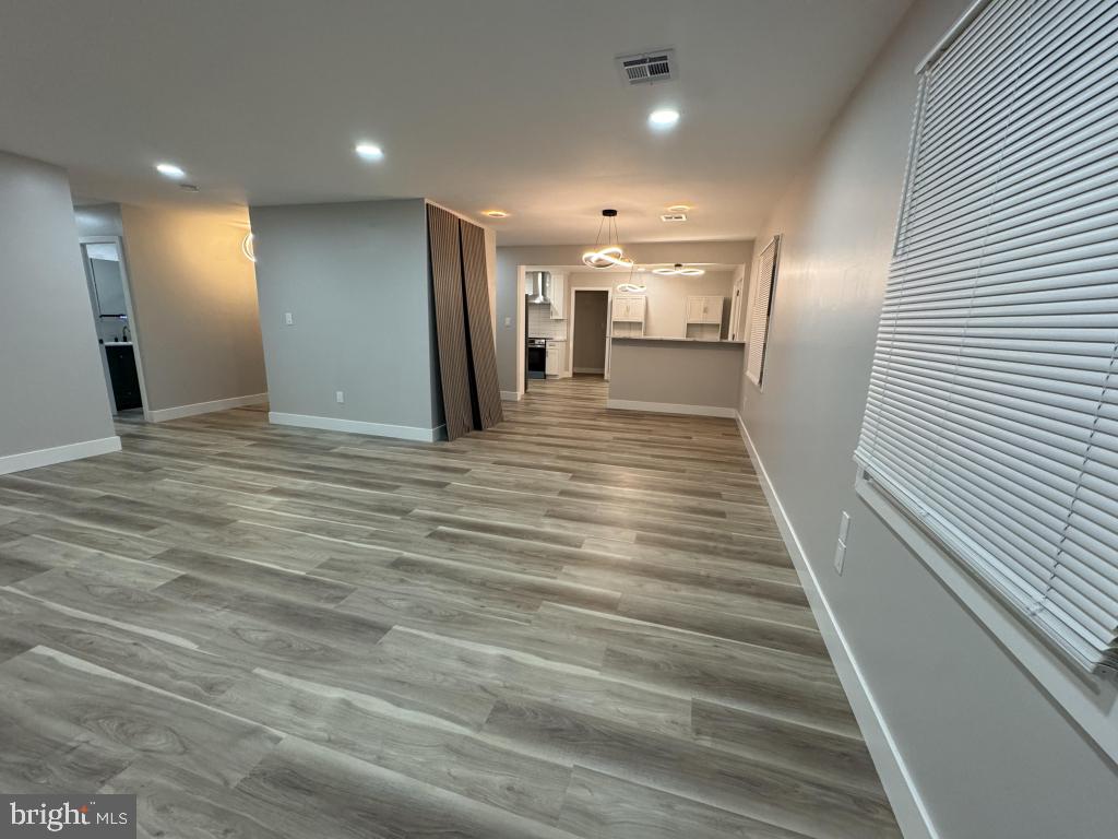 24 Pilgrim Lane Willingboro, NJ 08046 - Photo 18 of 31 a view of a hallway with the wooden floor