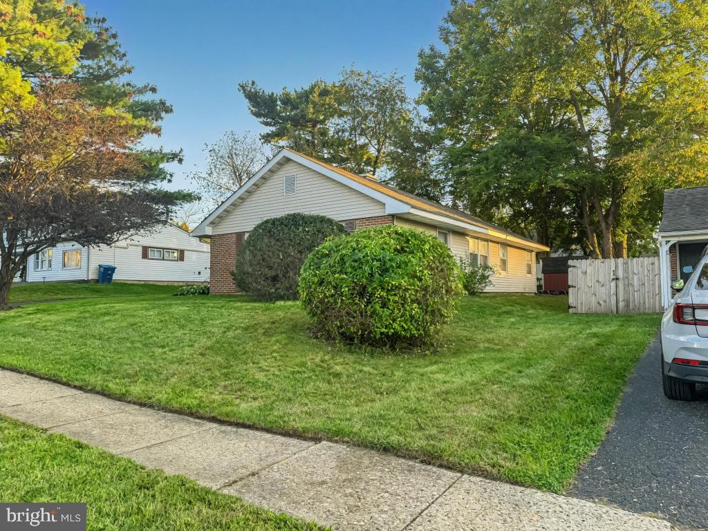 24 Pilgrim Lane Willingboro, NJ 08046 - Photo 30 of 31 a front view of house with a garden