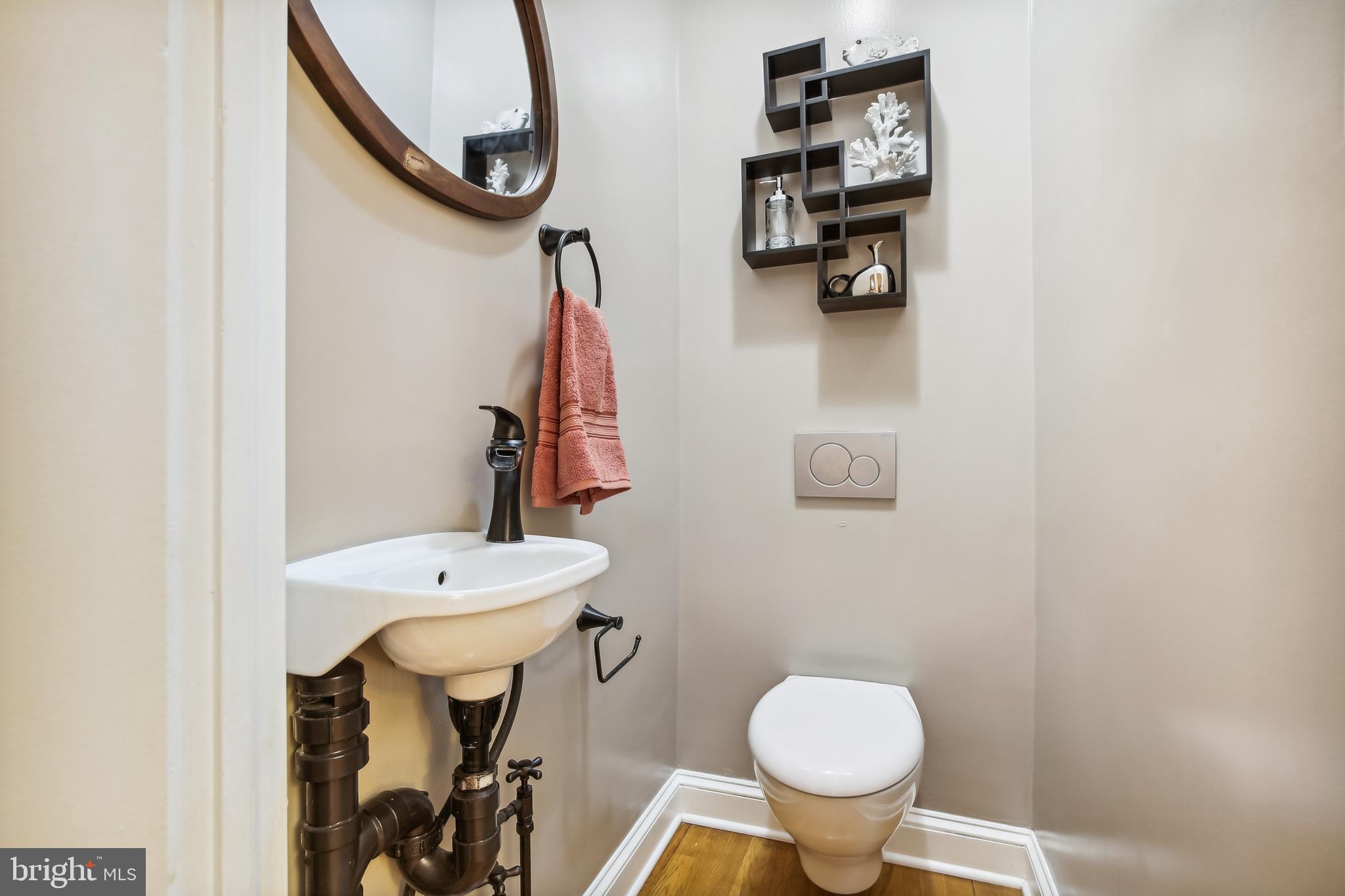 1770 Hobart Street Northwest Washington, DC 20009 - Photo 14 of 44 Rare 1st-floor half-bath, w/sleek wall-hung toilet