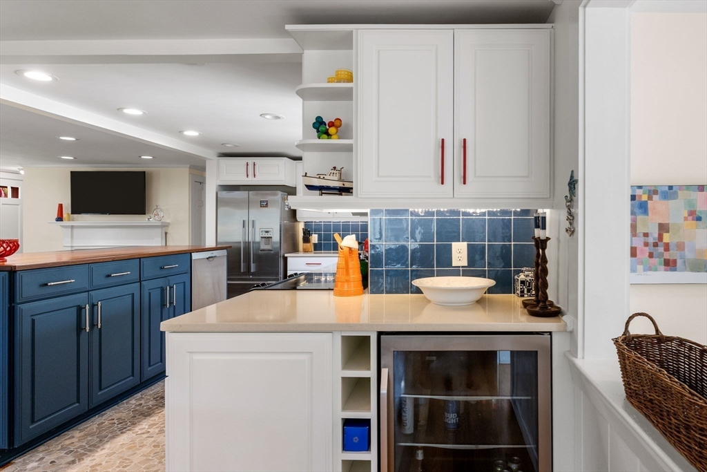 68 Gorham Road Harwich, MA 02646 - Photo 15 of 33 a kitchen with stainless steel appliances a stove a sink and a microwave