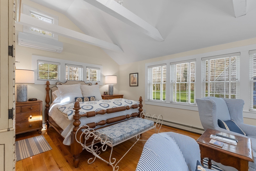 68 Gorham Road Harwich, MA 02646 - Photo 16 of 33 a bedroom with bed and windows