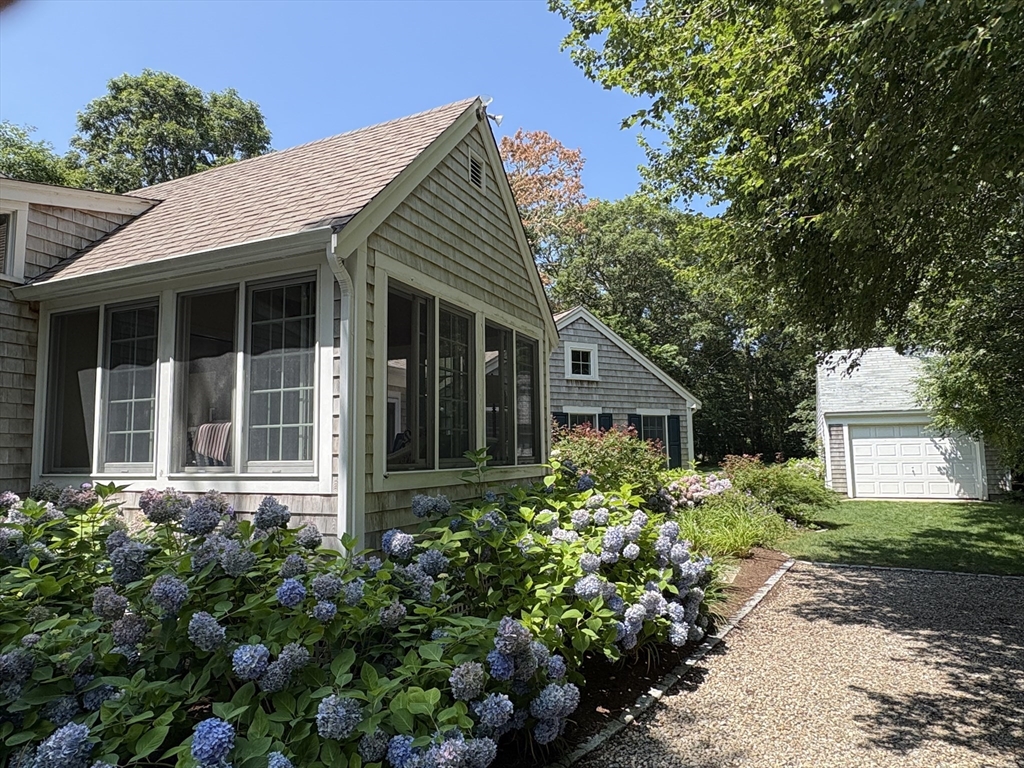 68 Gorham Road Harwich, MA 02646 - Photo 2 of 33 front view of a house with a yard