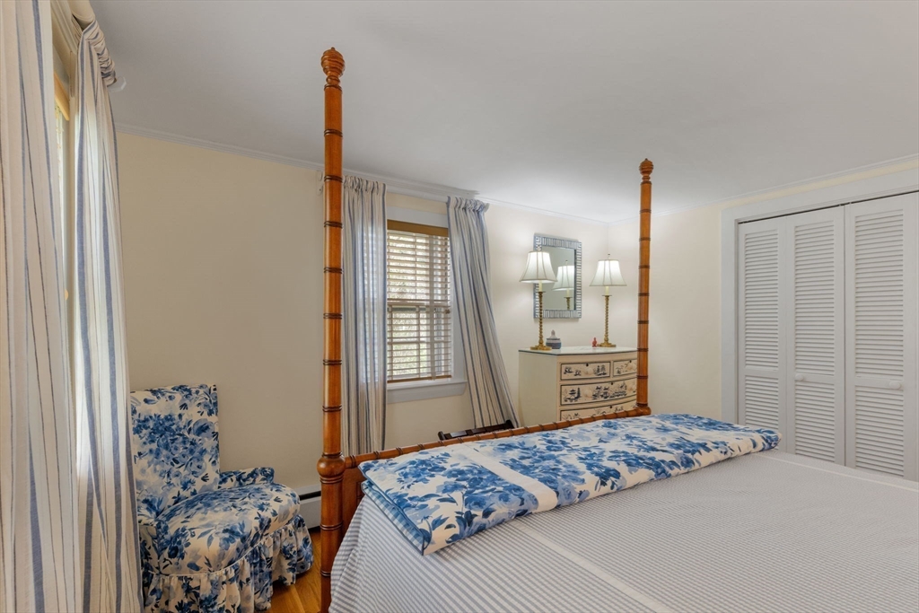 68 Gorham Road Harwich, MA 02646 - Photo 21 of 33 a bedroom with a large bed and a window