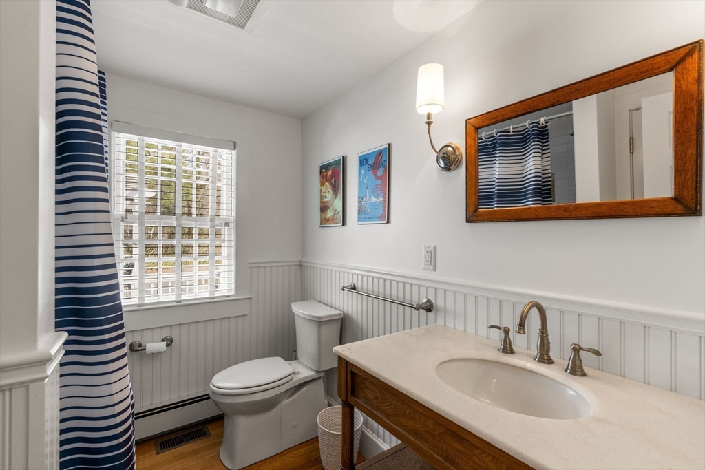 68 Gorham Road Harwich, MA 02646 - Photo 22 of 33 a bathroom with a sink toilet and mirror