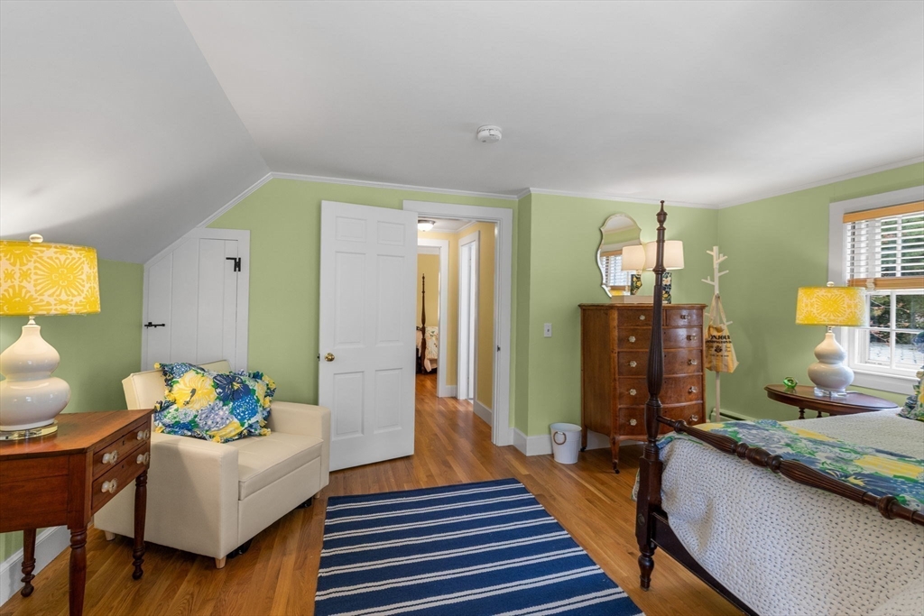 68 Gorham Road Harwich, MA 02646 - Photo 25 of 33 a living room with furniture and a wooden floor