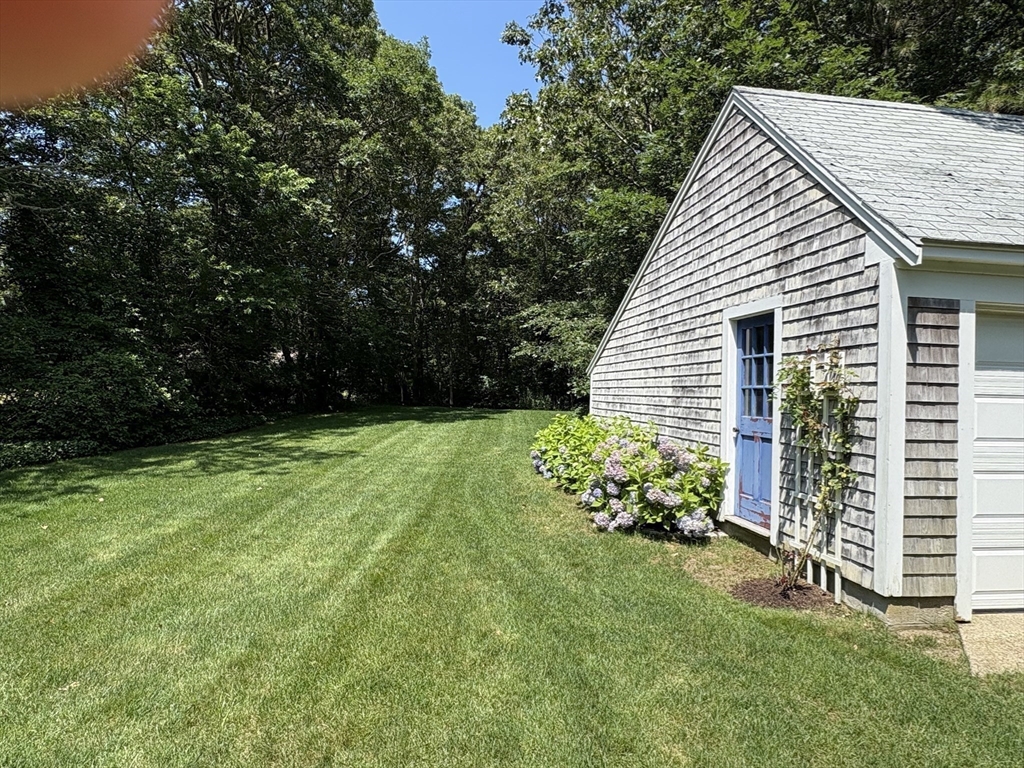 68 Gorham Road Harwich, MA 02646 - Photo 33 of 33 a front view of a house with garden
