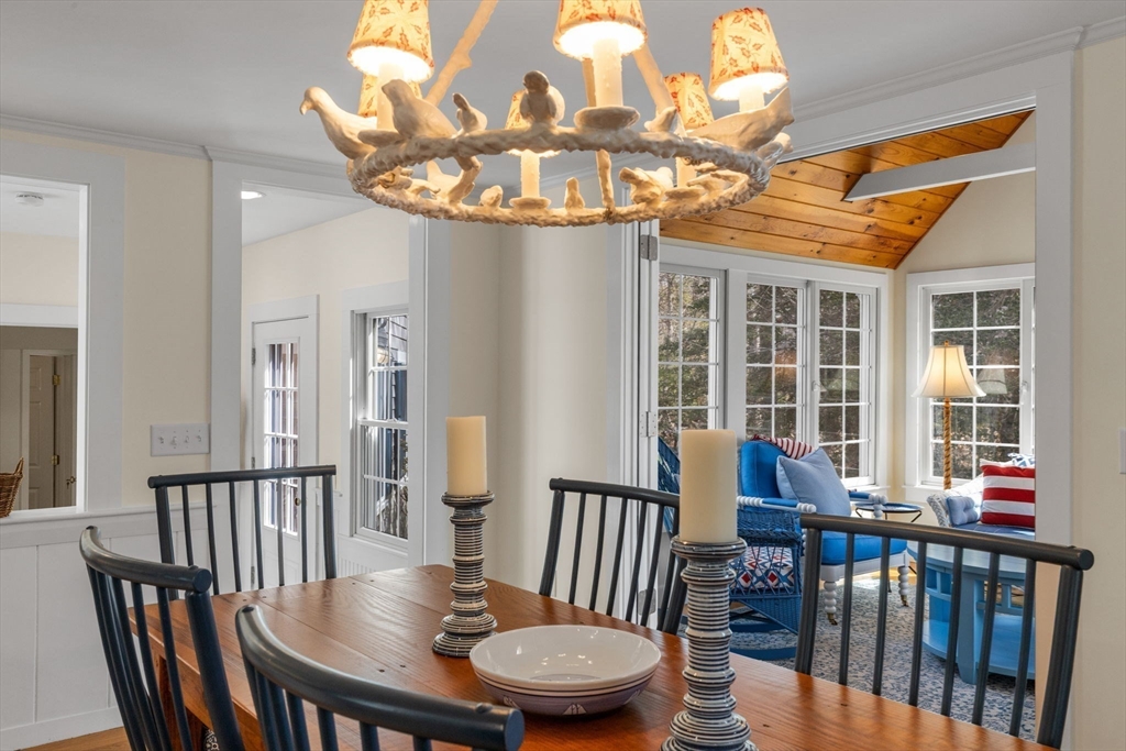 68 Gorham Road Harwich, MA 02646 - Photo 9 of 33 a view of a dining room with furniture window and outside view