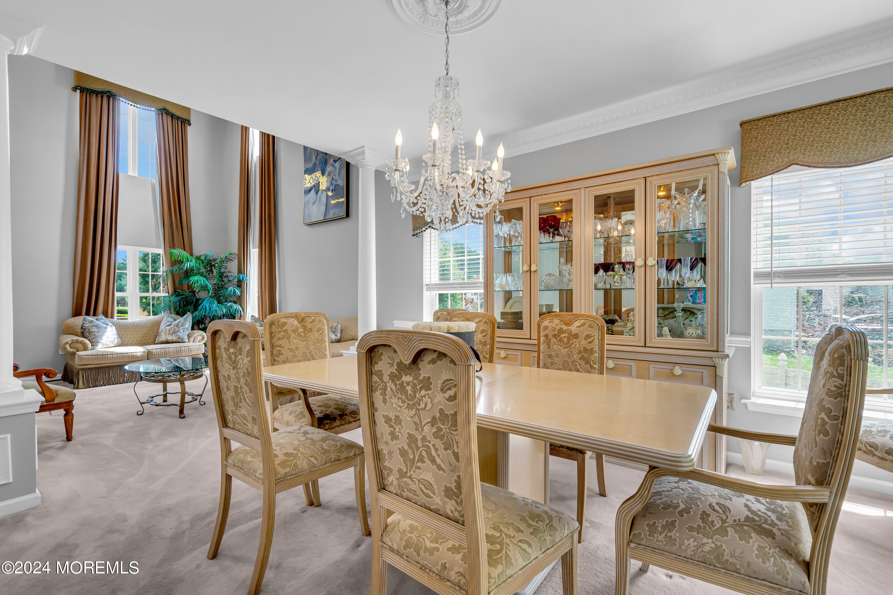 22 Cedar Knoll Road Jackson, NJ 08527 - Photo 16 of 76 a dining room with furniture a chandelier and window
