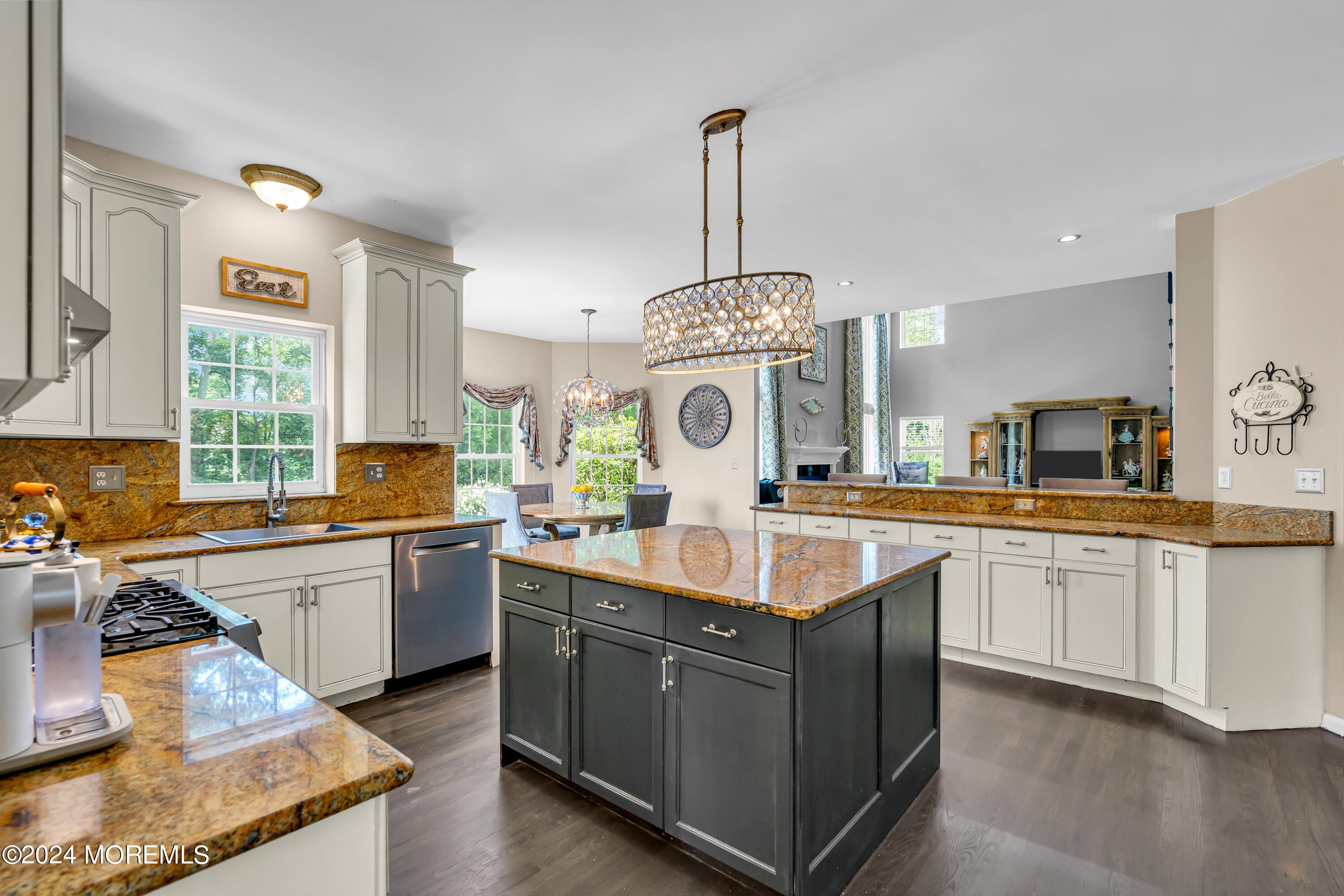 22 Cedar Knoll Road Jackson, NJ 08527 - Photo 17 of 76 a large kitchen with kitchen island a stove a sink a center island and wooden floor