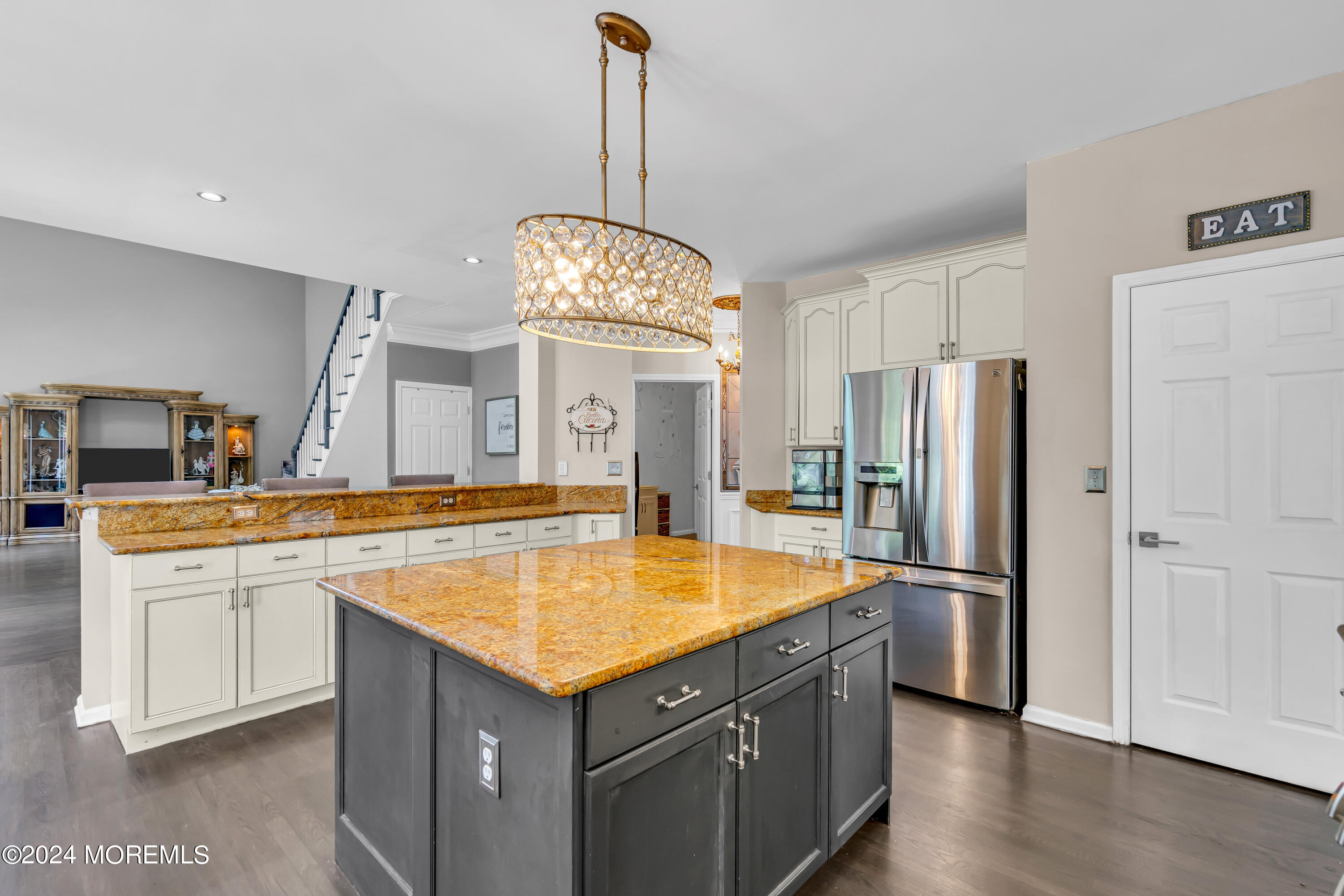 22 Cedar Knoll Road Jackson, NJ 08527 - Photo 21 of 76 a kitchen with stainless steel appliances a sink a refrigerator a center island and a stove