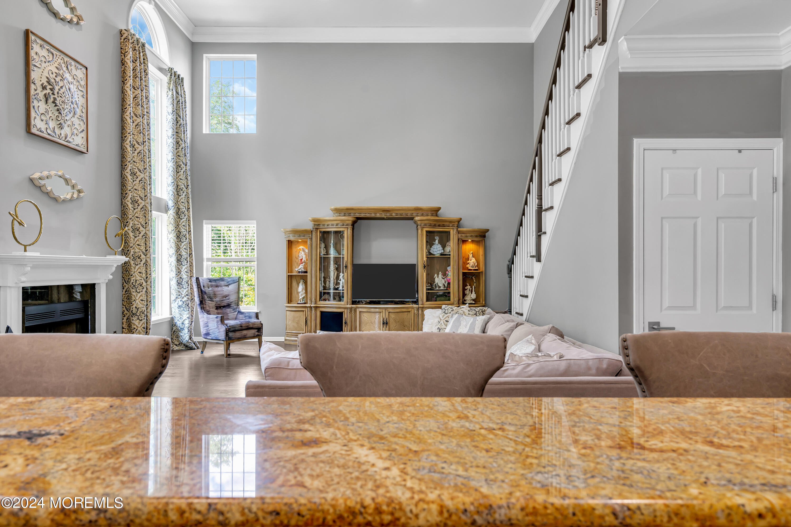 22 Cedar Knoll Road Jackson, NJ 08527 - Photo 24 of 76 a living room with furniture and a fireplace