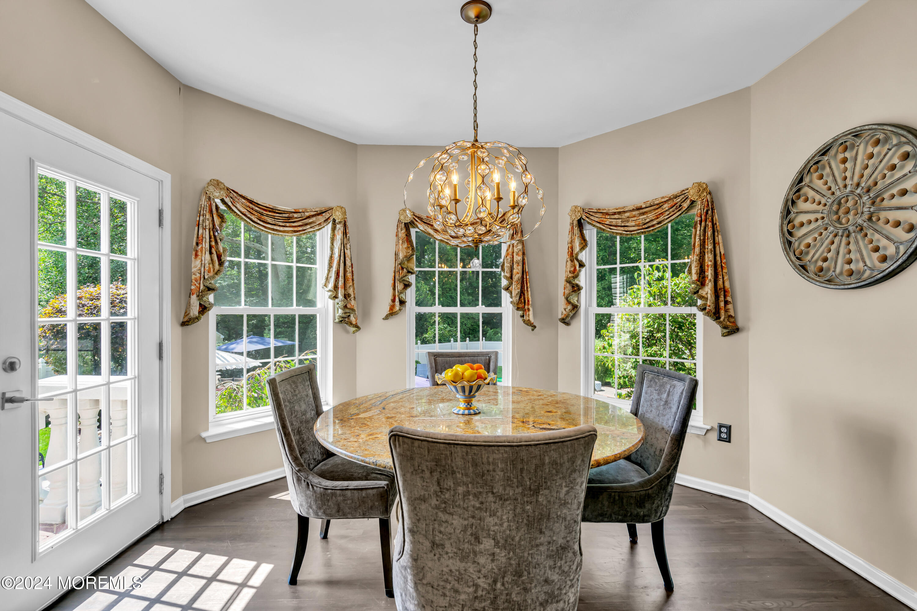 22 Cedar Knoll Road Jackson, NJ 08527 - Photo 25 of 76 a dining room with furniture a chandelier and wooden floor