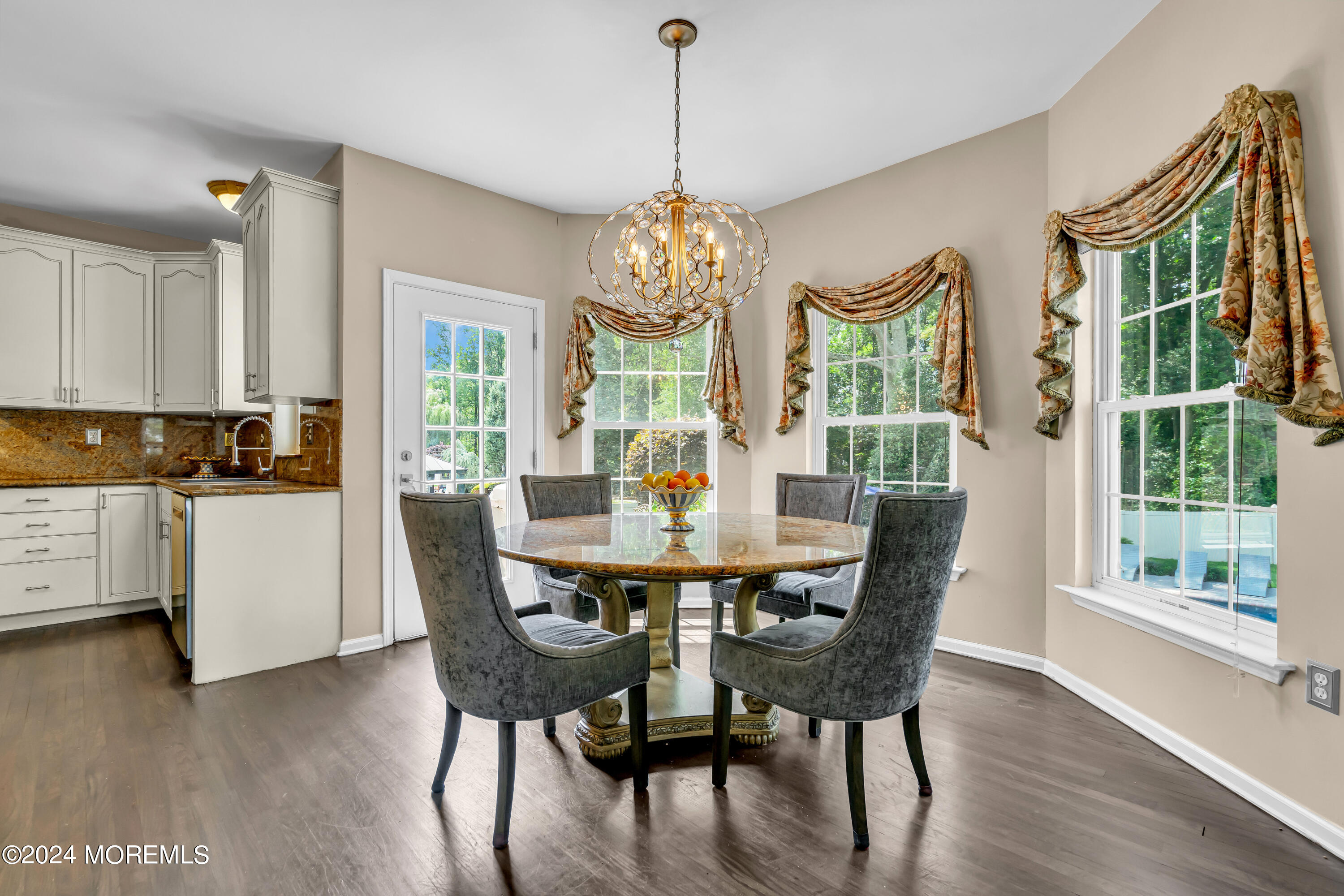 22 Cedar Knoll Road Jackson, NJ 08527 - Photo 27 of 76 a view of a dining room with furniture window and wooden floor