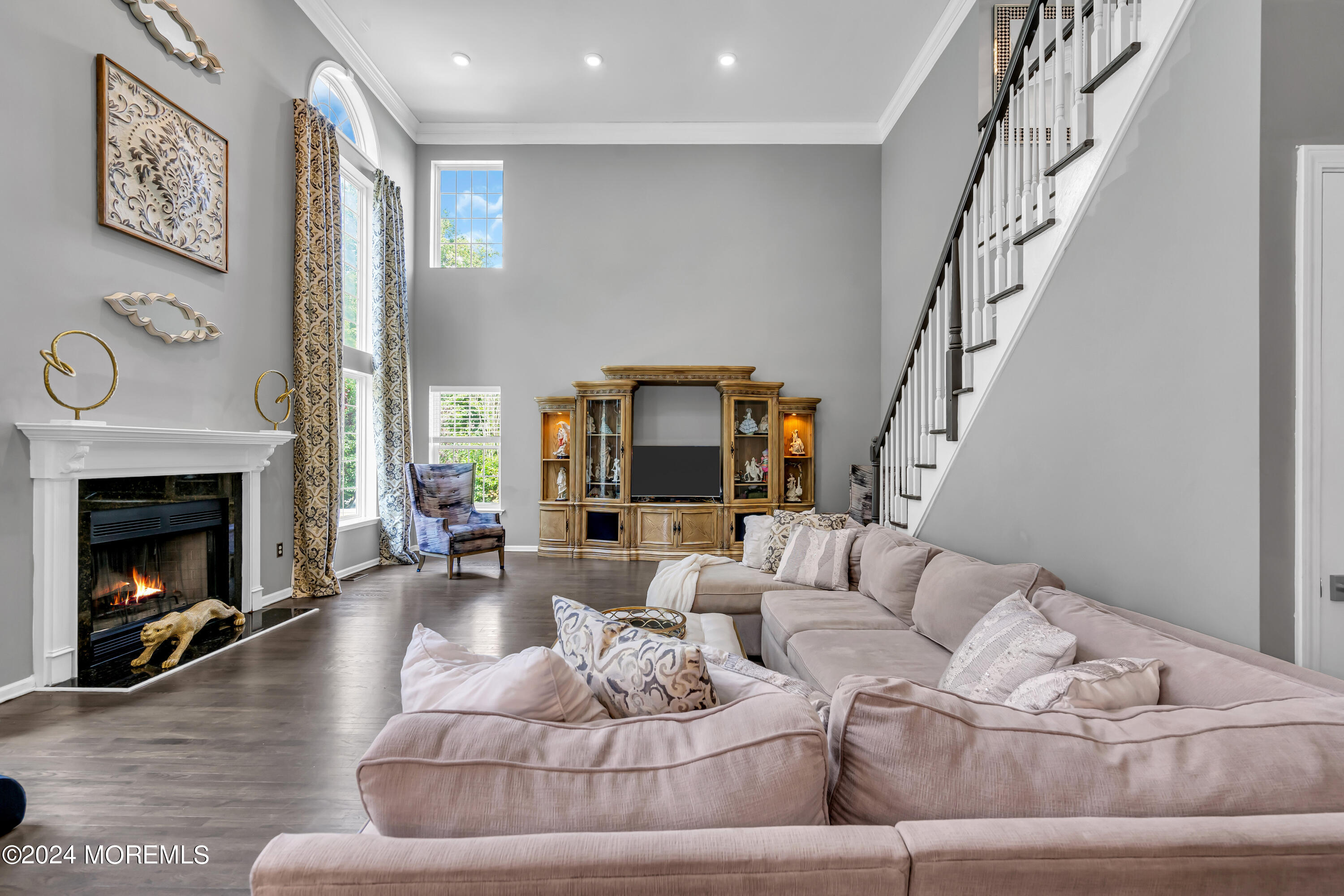 22 Cedar Knoll Road Jackson, NJ 08527 - Photo 29 of 76 a living room with furniture and a fireplace