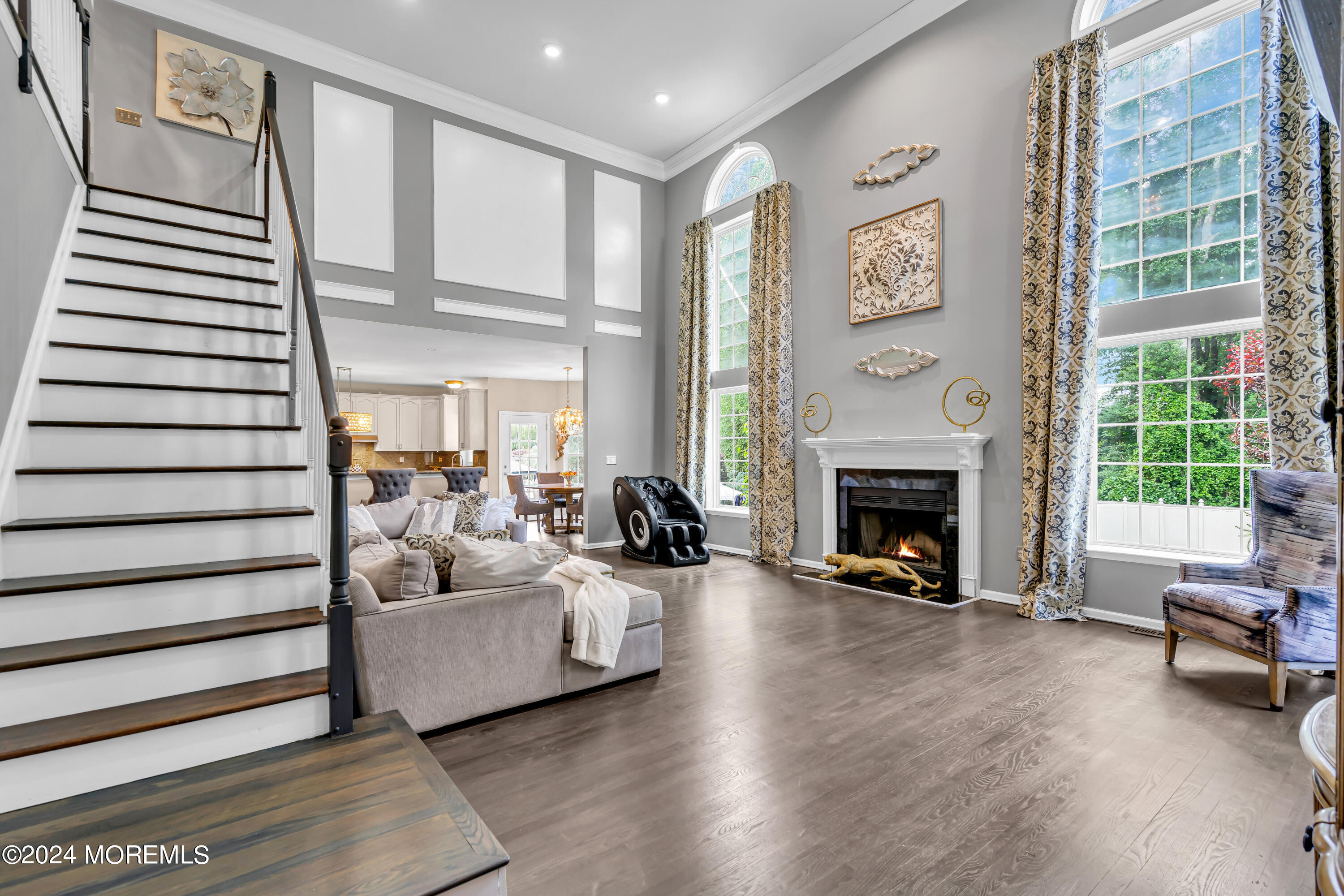 22 Cedar Knoll Road Jackson, NJ 08527 - Photo 33 of 76 a living room with furniture and a fireplace