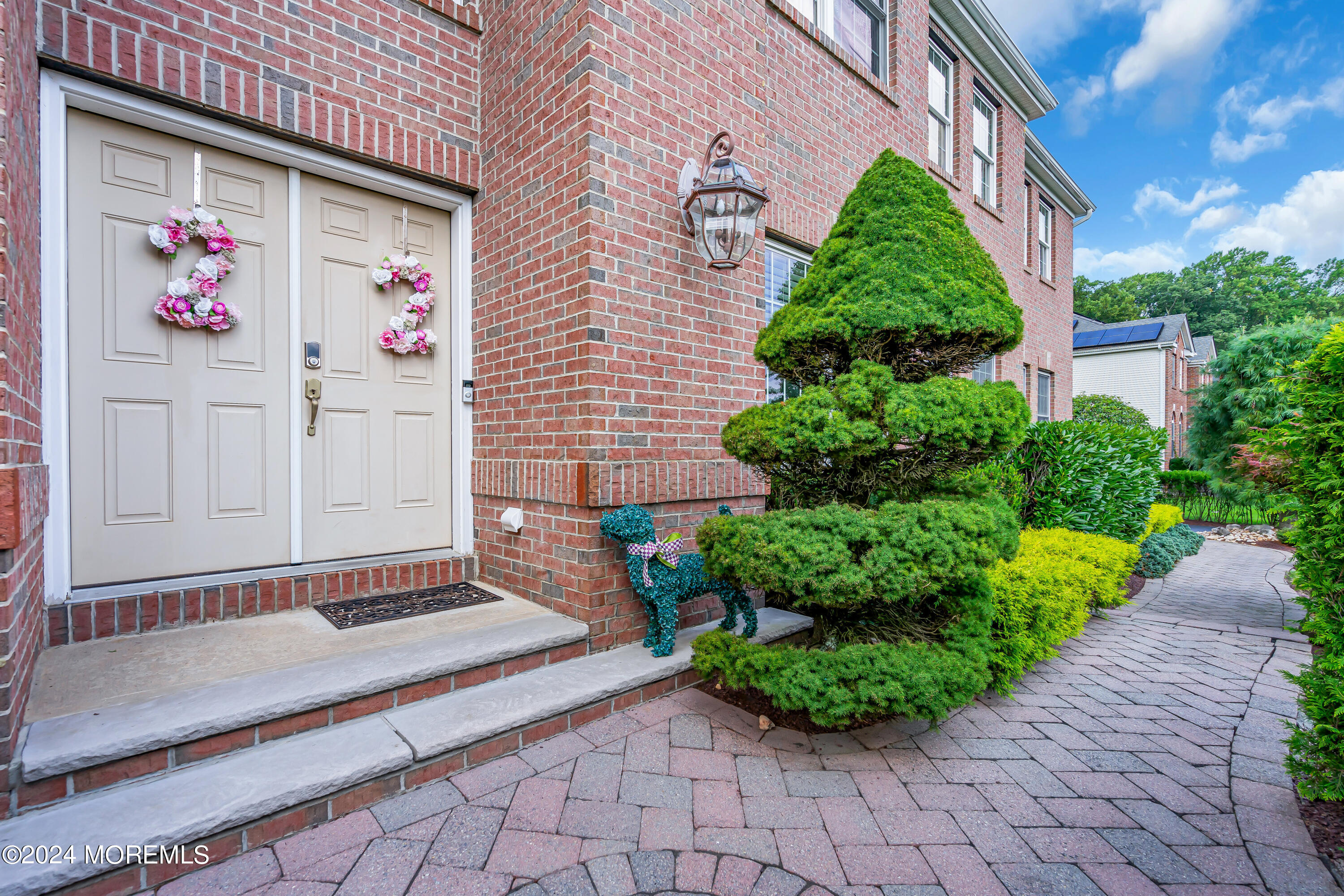 22 Cedar Knoll Road Jackson, NJ 08527 - Photo 4 of 76 a front view of a house with garden