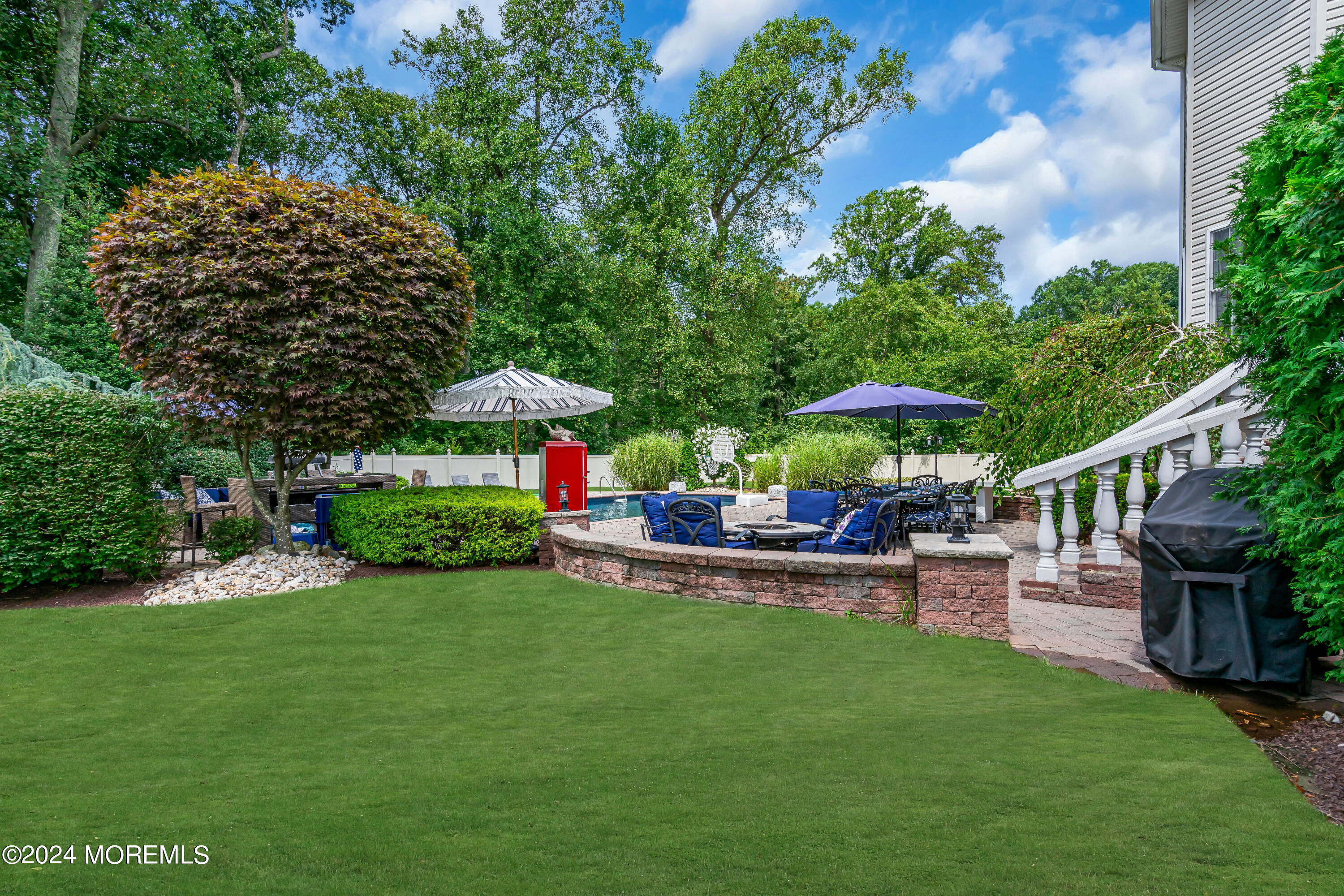 22 Cedar Knoll Road Jackson, NJ 08527 - Photo 64 of 76 a view of a house with a yard and sitting area