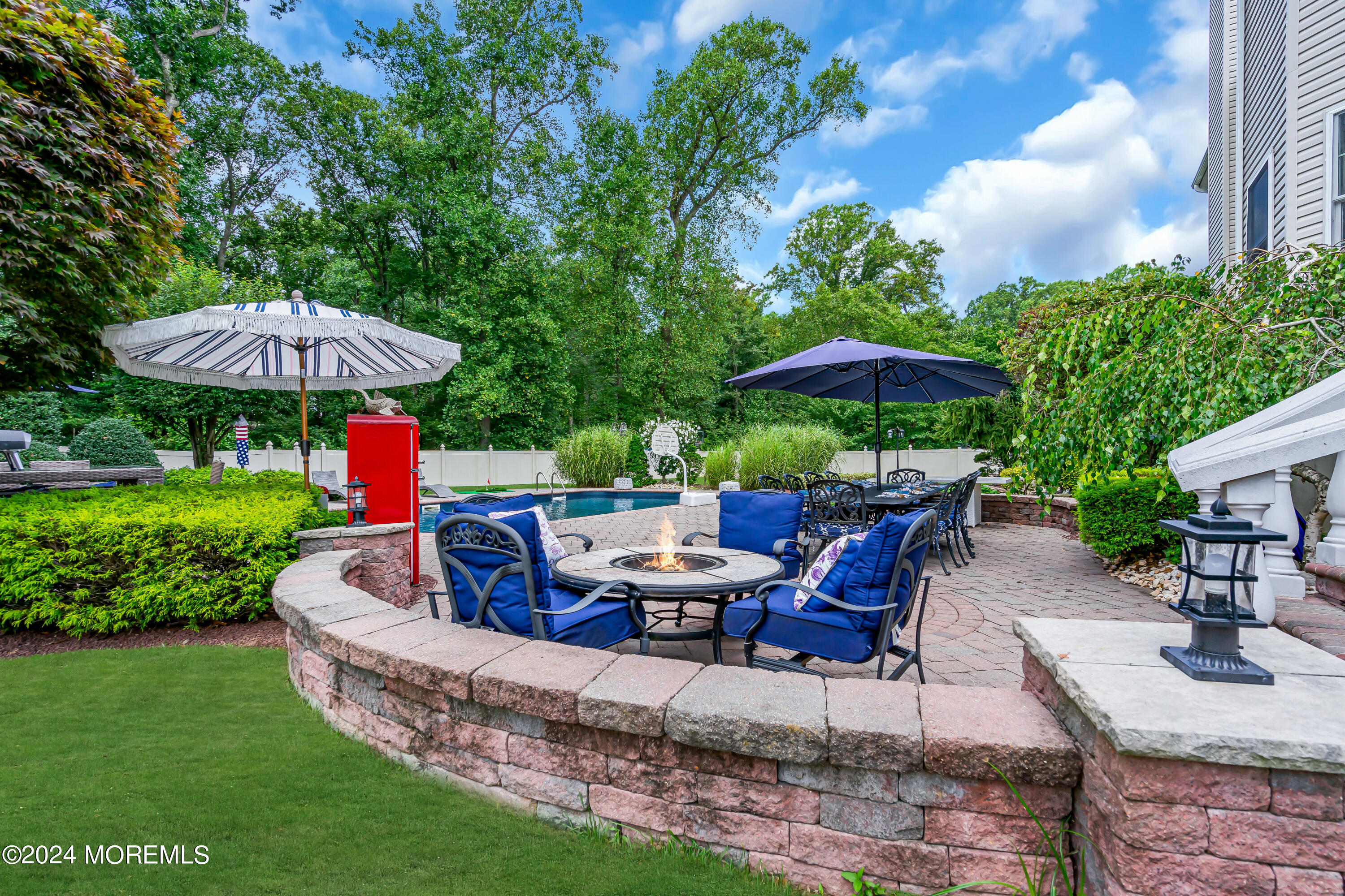 22 Cedar Knoll Road Jackson, NJ 08527 - Photo 65 of 76 a view of a backyard with furniture and a small yard