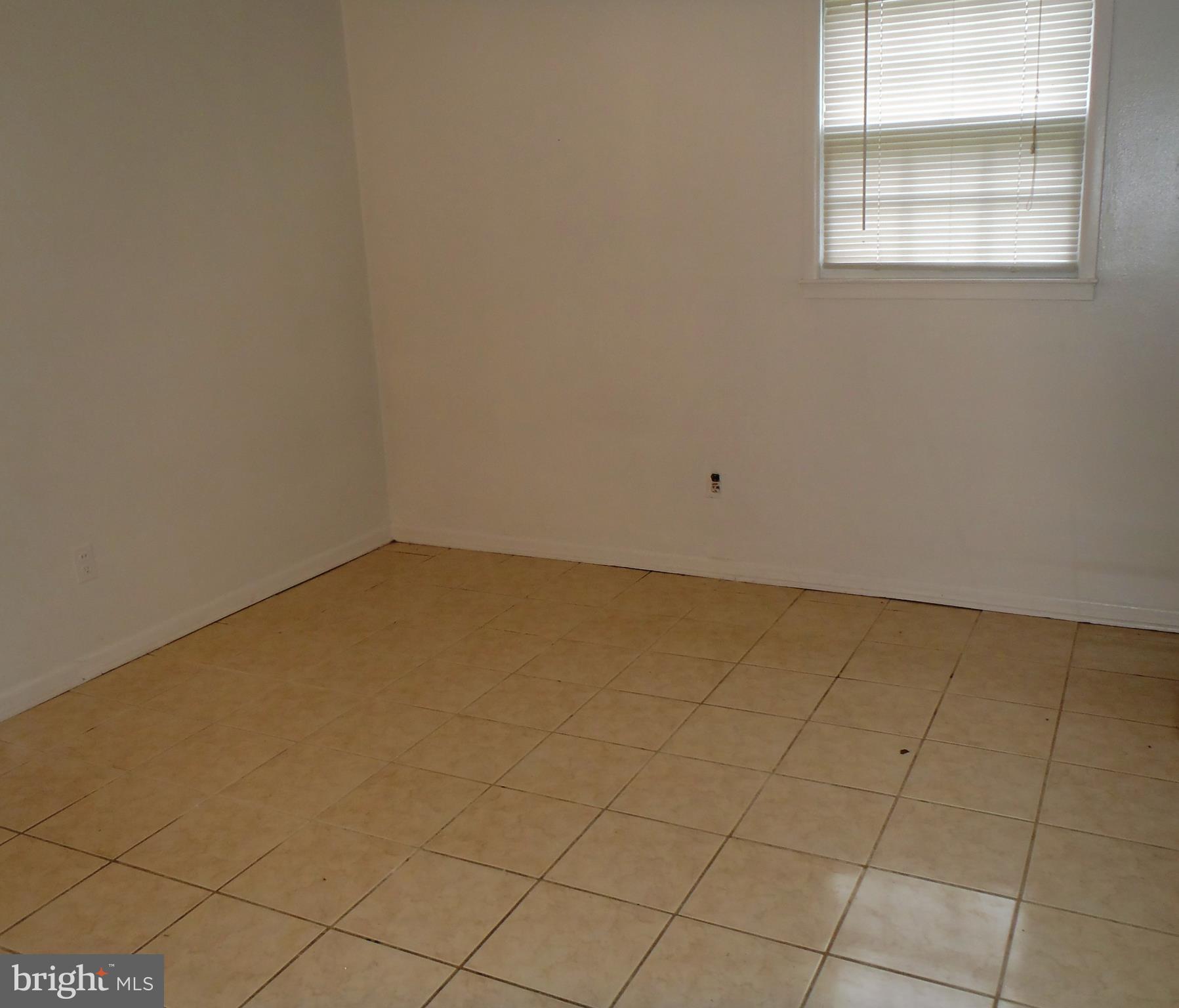 12003 Cook Court Silver Spring, MD 20902 - Photo 11 of 20 2nd lower level bedroom, ceramic tile.