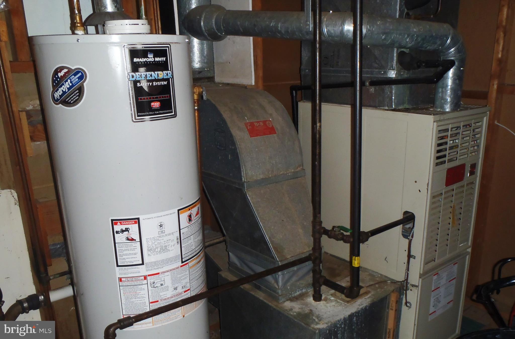12003 Cook Court Silver Spring, MD 20902 - Photo 15 of 20 Gas furnace and gas hot water heater.