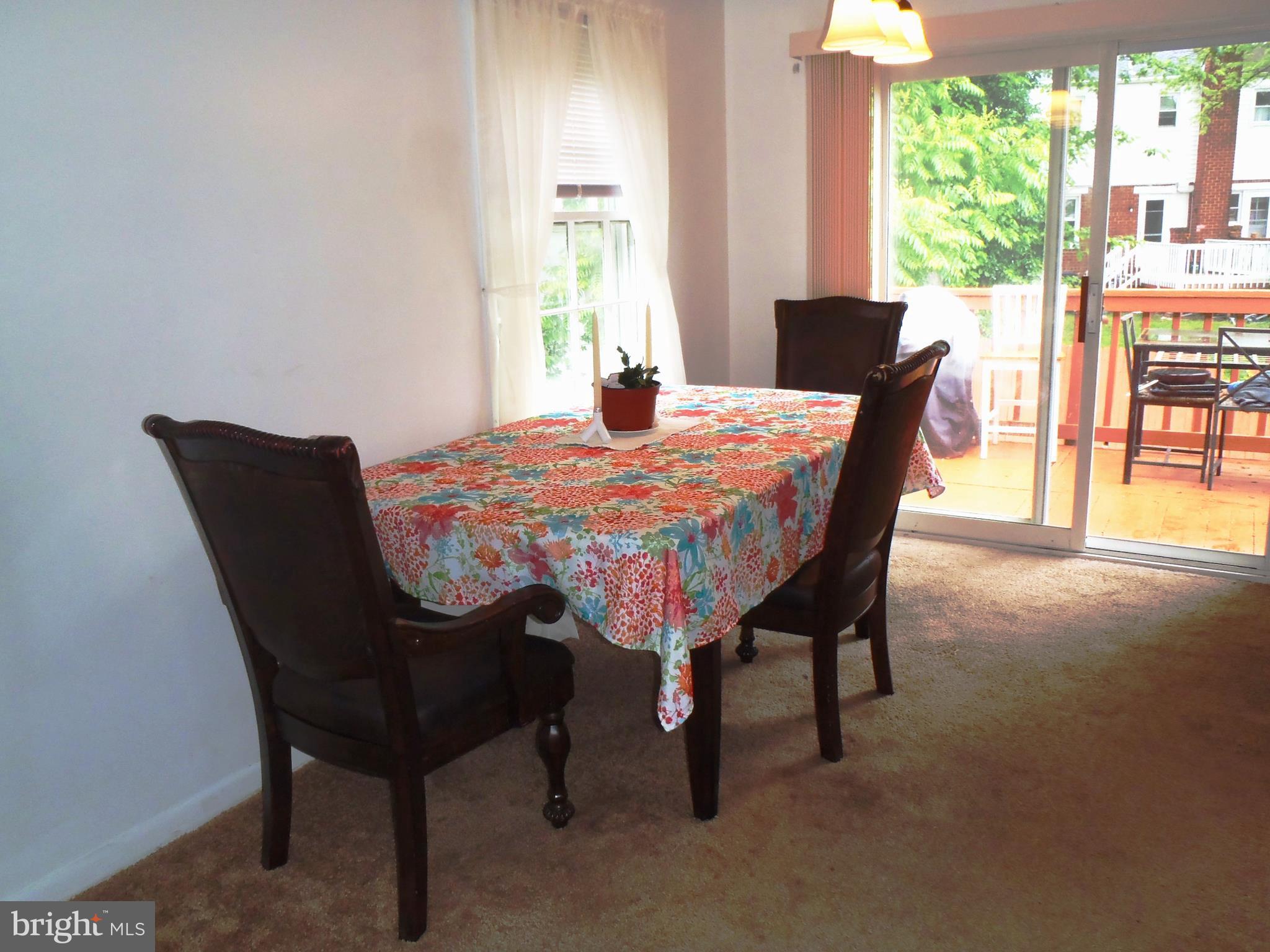 12003 Cook Court Silver Spring, MD 20902 - Photo 5 of 20 Dining Area with sliders to a deck.