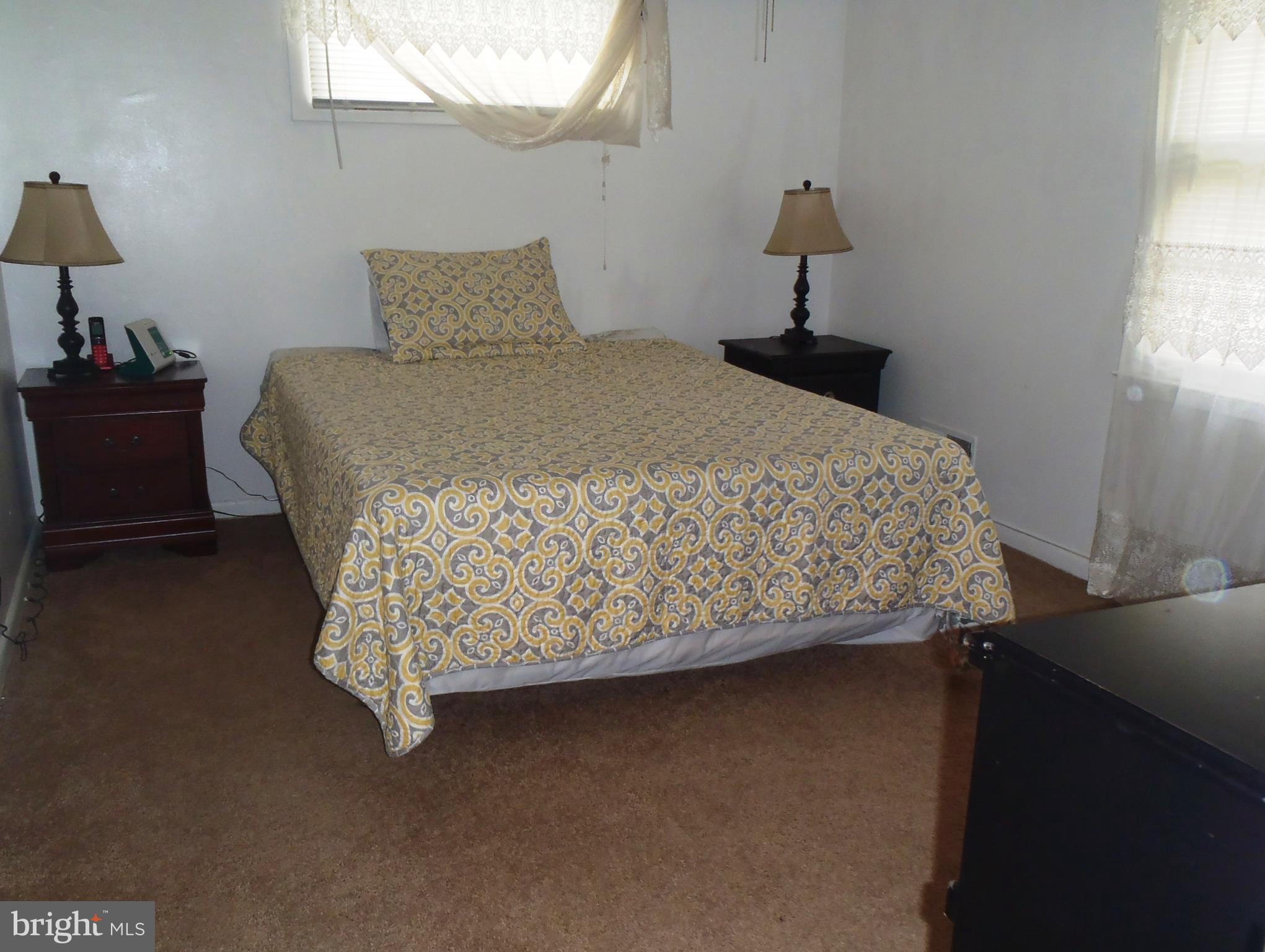 12003 Cook Court Silver Spring, MD 20902 - Photo 7 of 20 1st upper level bedroom, carpet over hardwood.