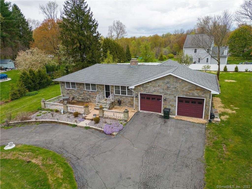 a view of house with outdoor entertaining spaces