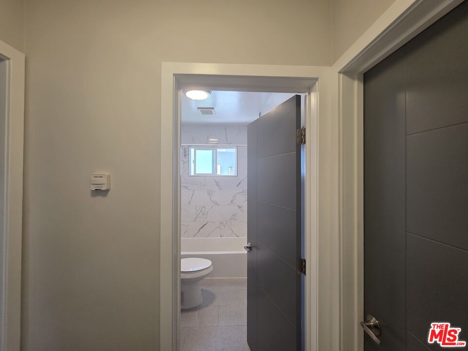 1505 South Cochran Avenue, Unit 4 Los Angeles, CA 90019 - Photo 22 of 45 a bathroom with a toilet