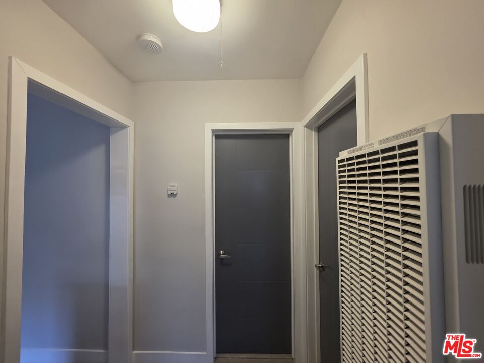 1505 South Cochran Avenue, Unit 4 Los Angeles, CA 90019 - Photo 44 of 45 a view of room with window