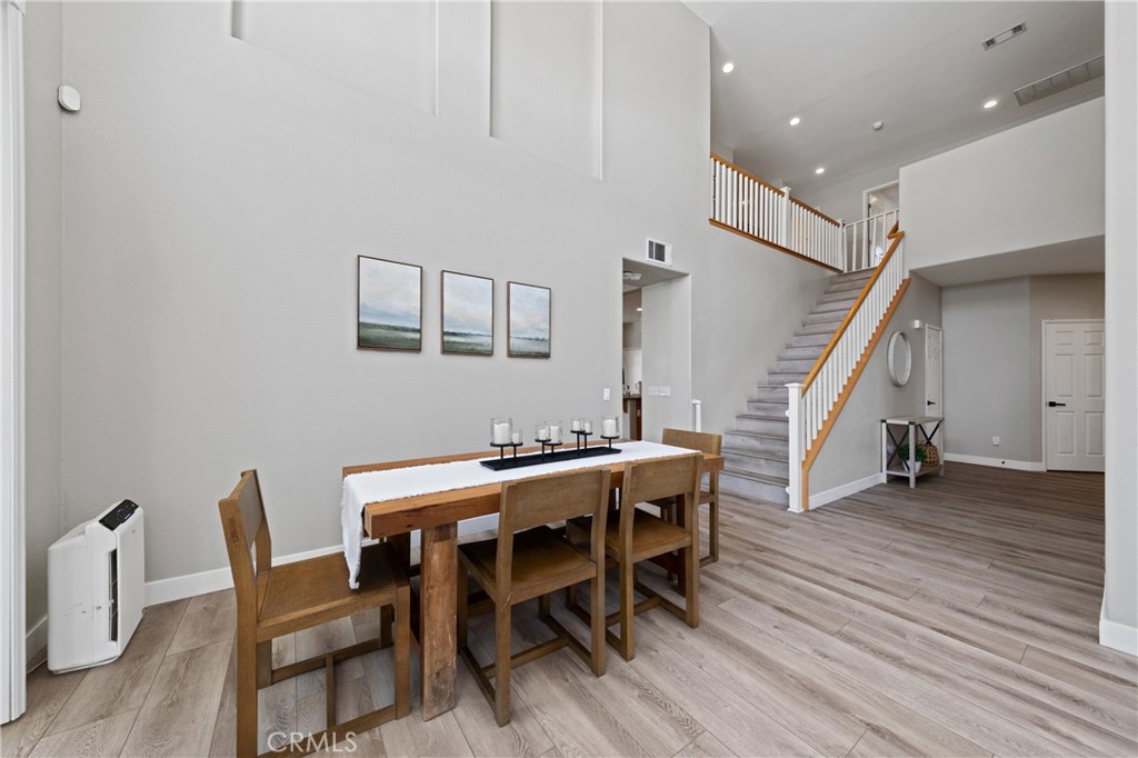 32985 Novara Court Temecula, CA 92592 - Photo 21 of 56 Dining Area And Staircase With Modern Open Layout