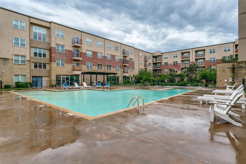 1100 West Trinity Mills Road, Unit 3005 Carrollton, TX 75006 - Photo 4 of 15 a view of building with yard in front of it