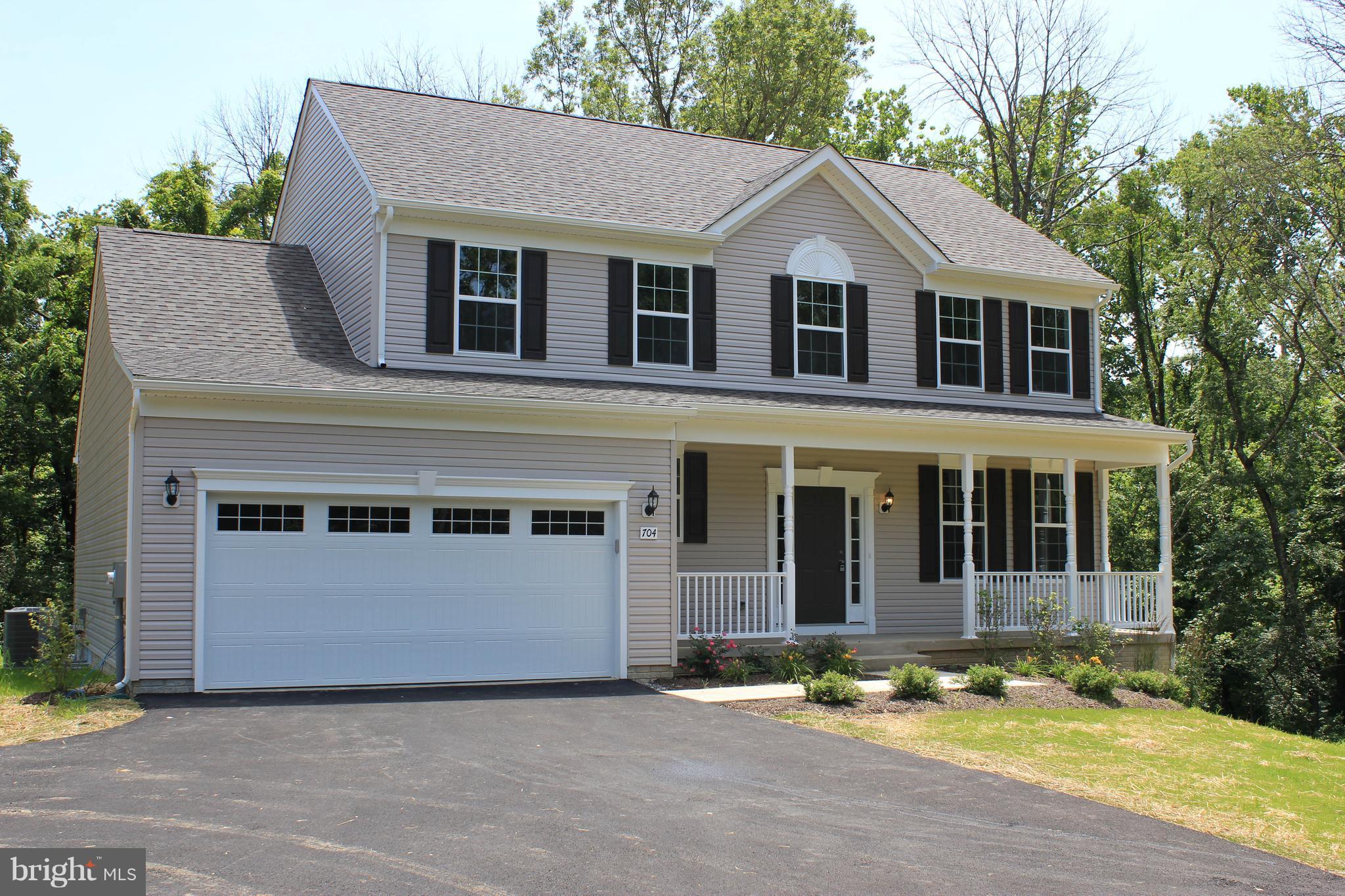 704 Nestle Quarry Road Falling Waters, WV 25419 - Photo 1 of 8 Exterior (Rear)
