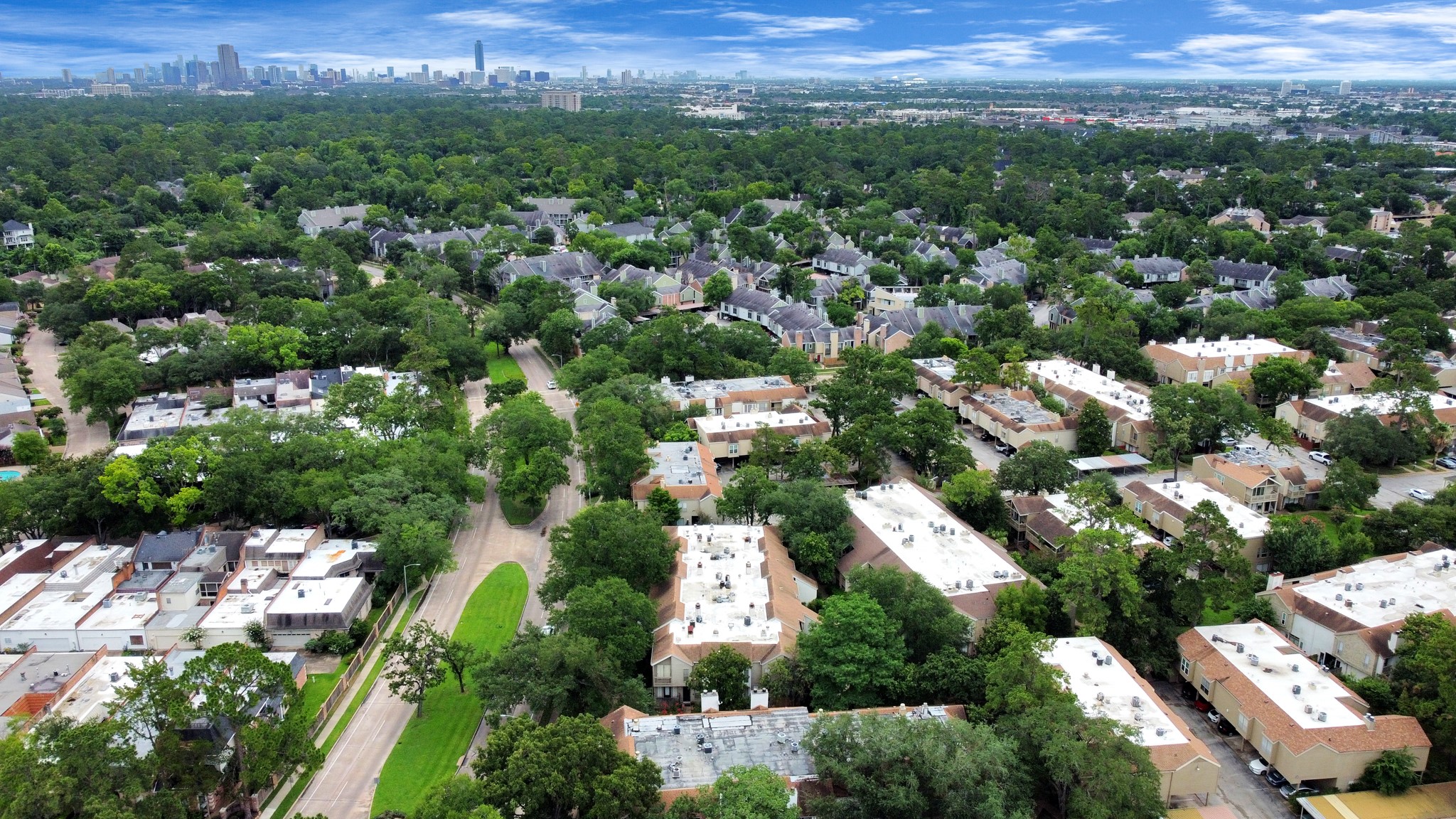 2100 Tanglewilde Street, Unit 312 Houston, TX 77063 - Photo 2 of 11 an aerial view of residential houses with outdoor space and trees