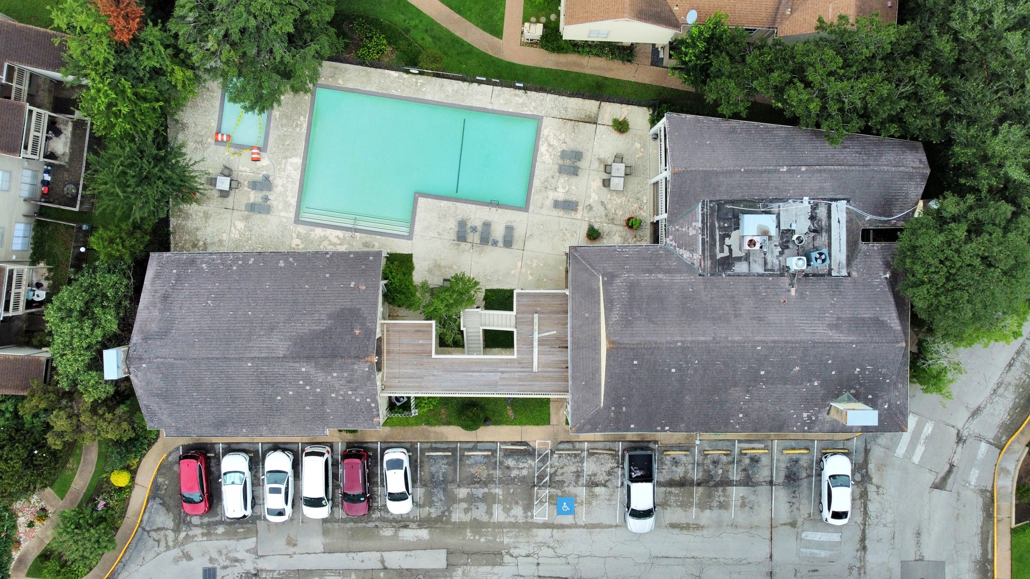2100 Tanglewilde Street, Unit 312 Houston, TX 77063 - Photo 3 of 11 an aerial view of a house with outdoor space and seating area