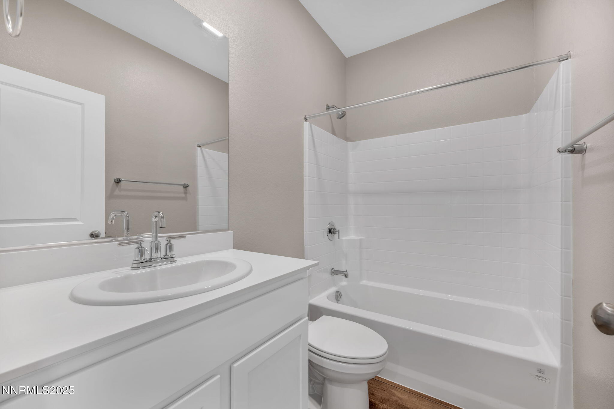 1334 Nebula Road, Unit HOMESITE 94 Carson City, NV 89705 - Photo 17 of 22 a bathroom with a sink toilet and shower