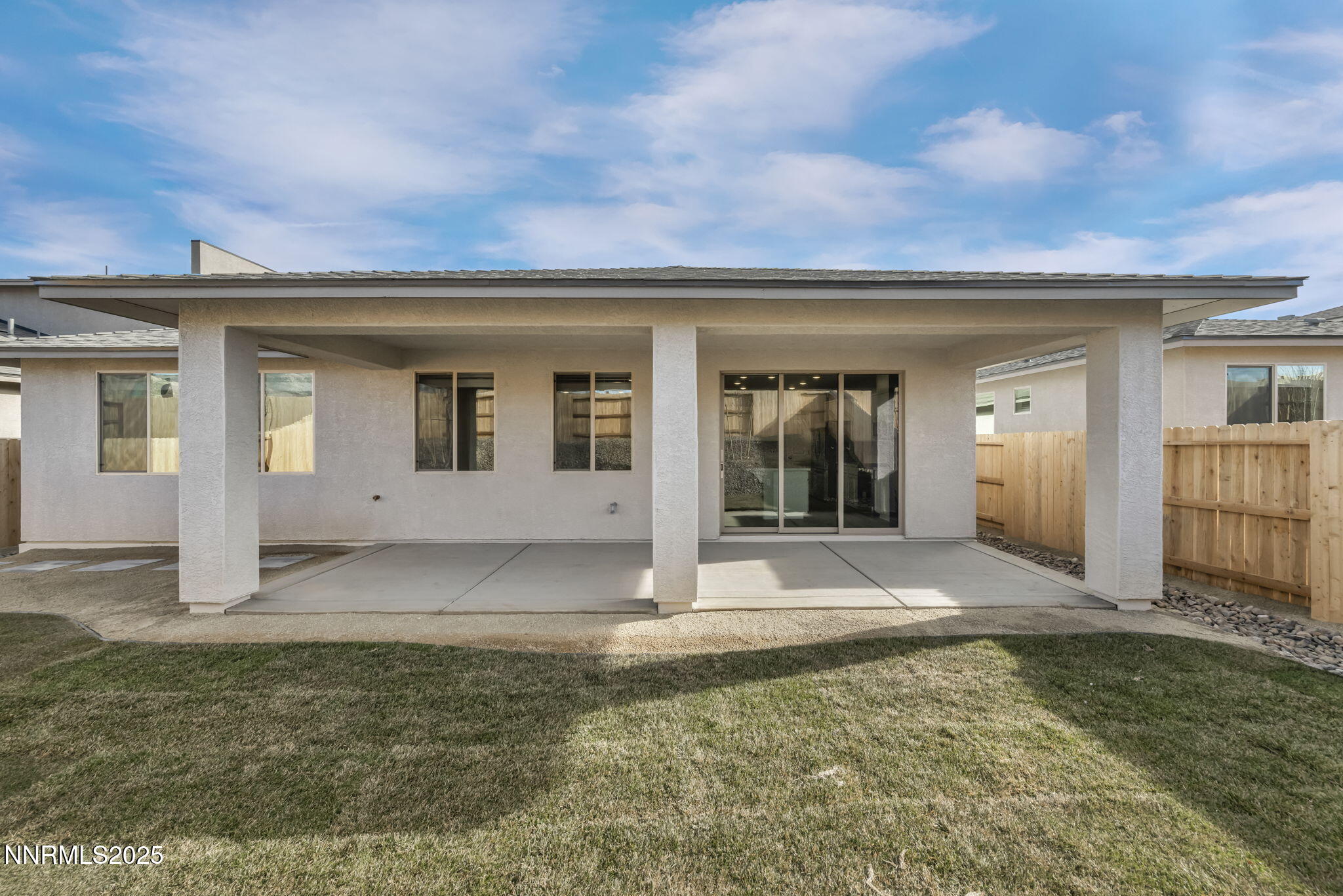 1334 Nebula Road, Unit HOMESITE 94 Carson City, NV 89705 - Photo 19 of 22 a view of a house with a backyard