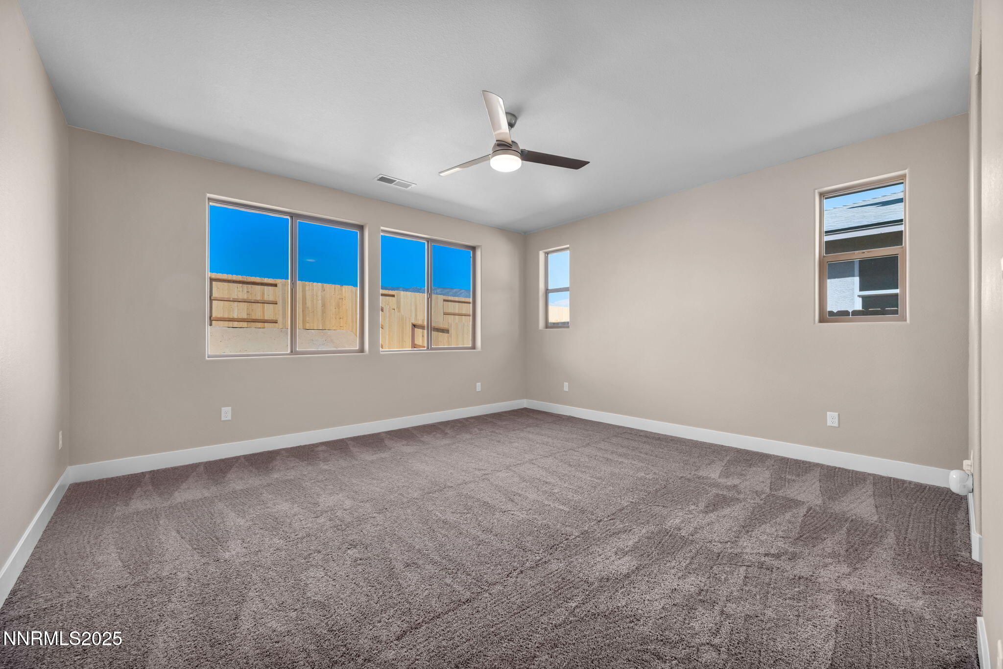 1334 Nebula Road, Unit HOMESITE 94 Carson City, NV 89705 - Photo 8 of 22 a view of an empty room with a window