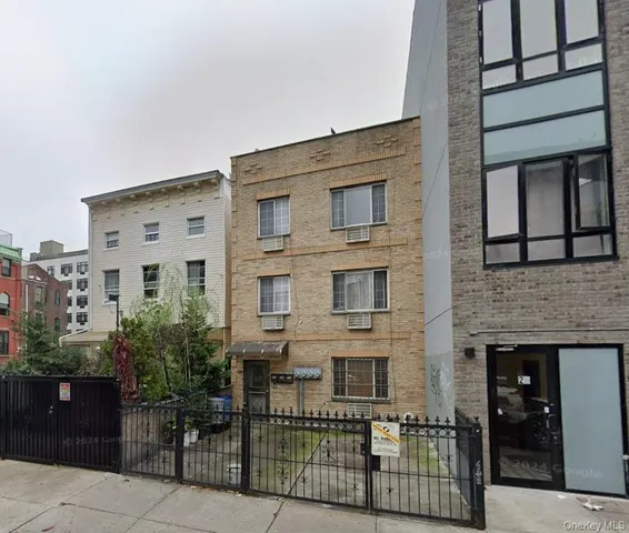a front view of a building with balcony