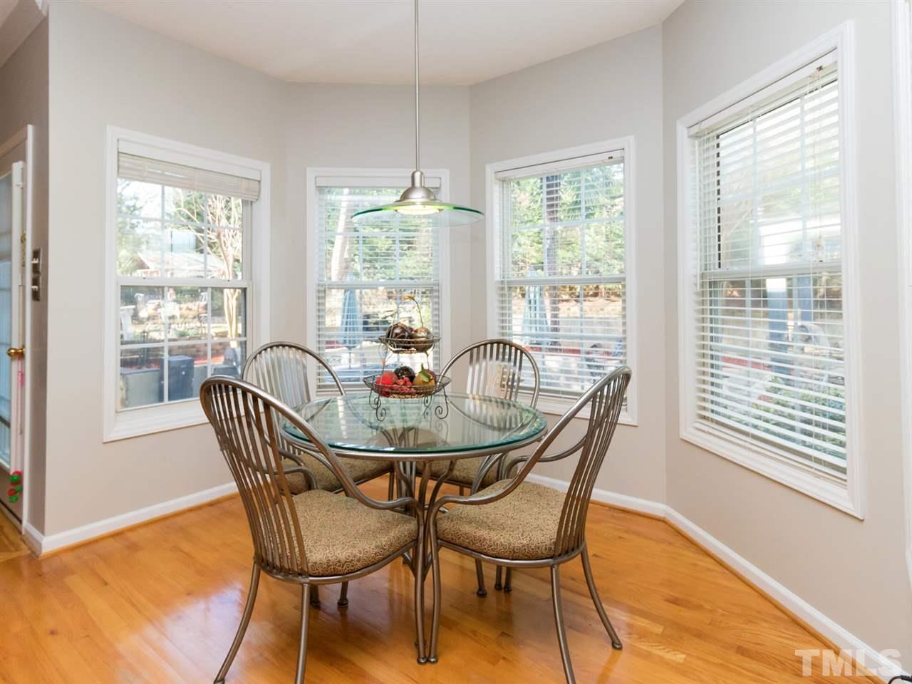 2500 Bulmer Terrace Raleigh, NC 27615 - Photo 9 of 25 a dining room with furniture window wooden floor