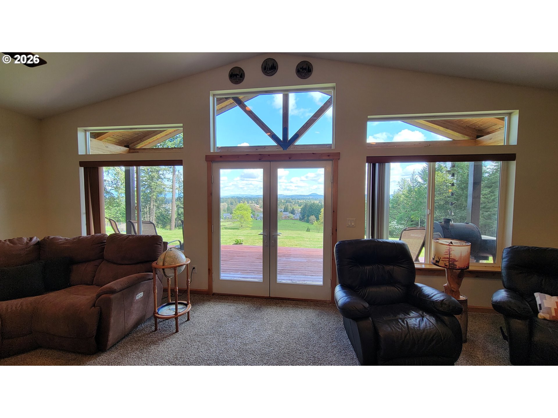 24674 Bolton Hill Road Veneta, OR 97487 - Photo 11 of 35 a living room with furniture and a large window