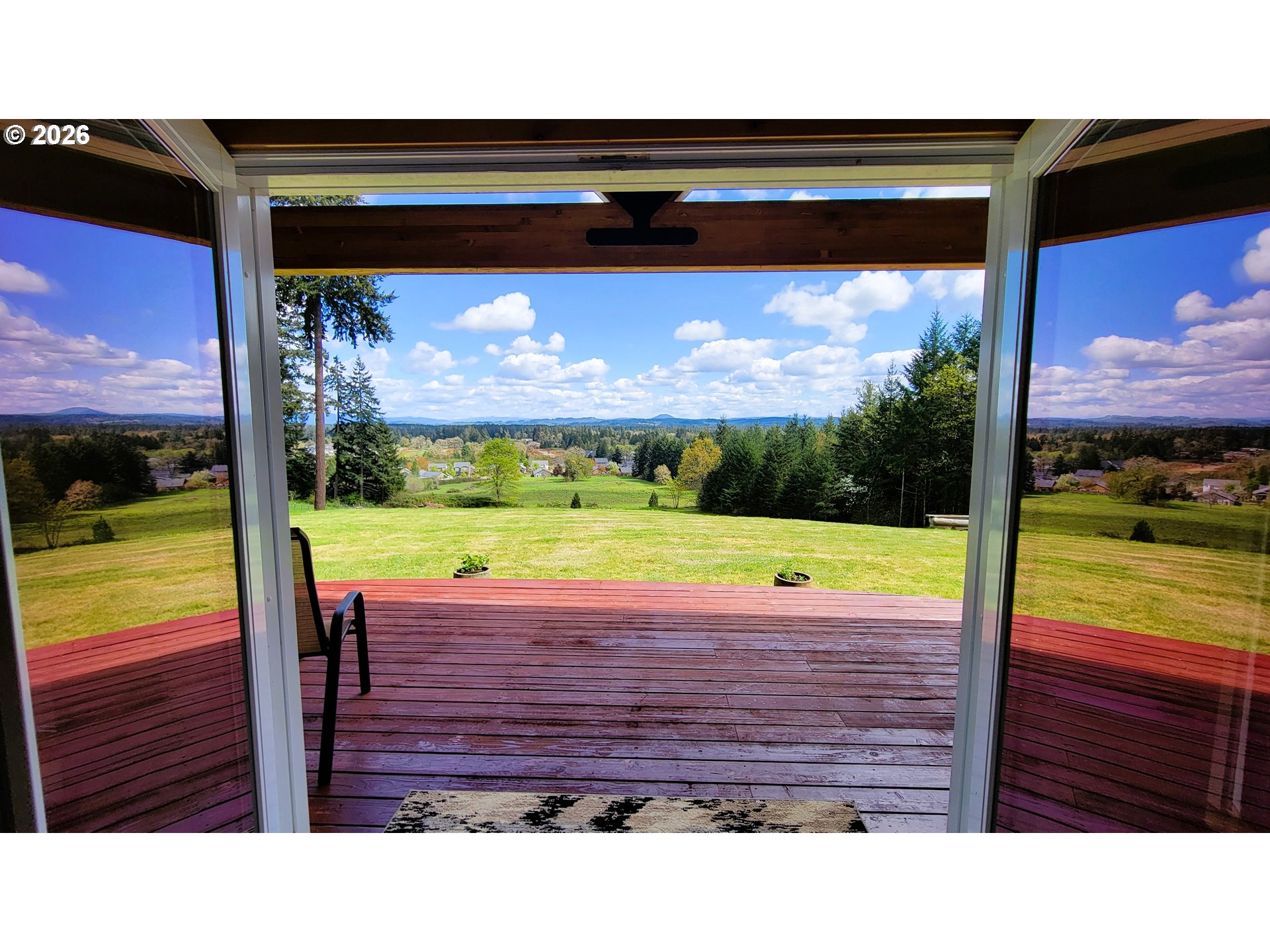 24674 Bolton Hill Road Veneta, OR 97487 - Photo 12 of 35 a view of a room with wooden floor