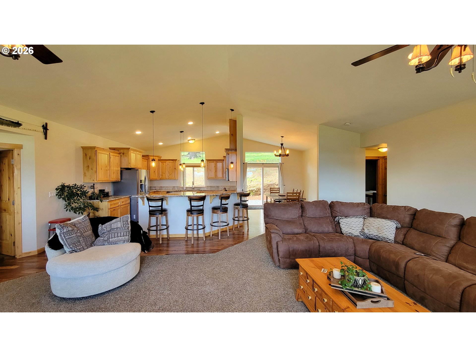 24674 Bolton Hill Road Veneta, OR 97487 - Photo 14 of 35 a living room with furniture and a large window