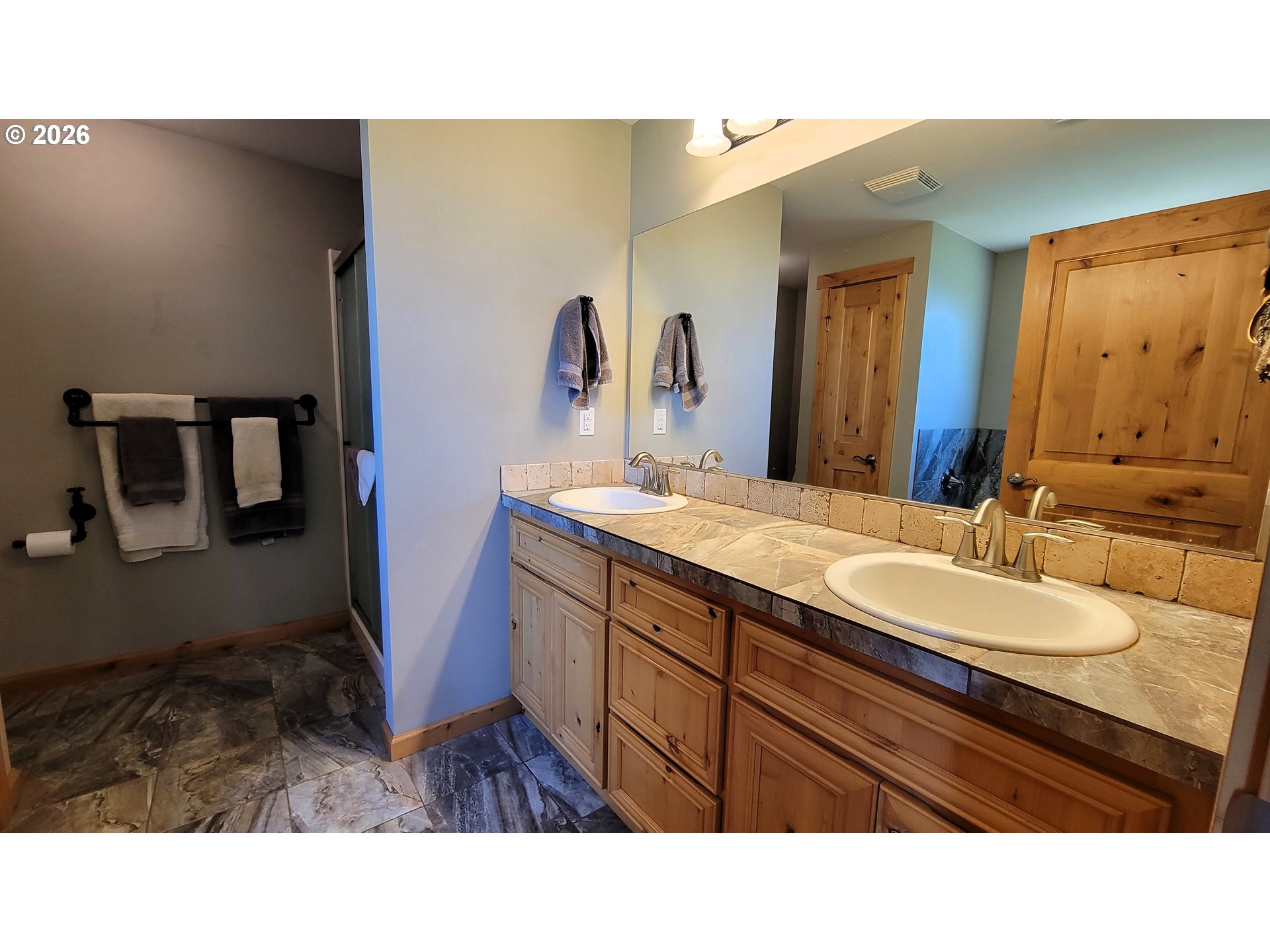 24674 Bolton Hill Road Veneta, OR 97487 - Photo 17 of 35 a bathroom with a sink double vanity granite and a mirror