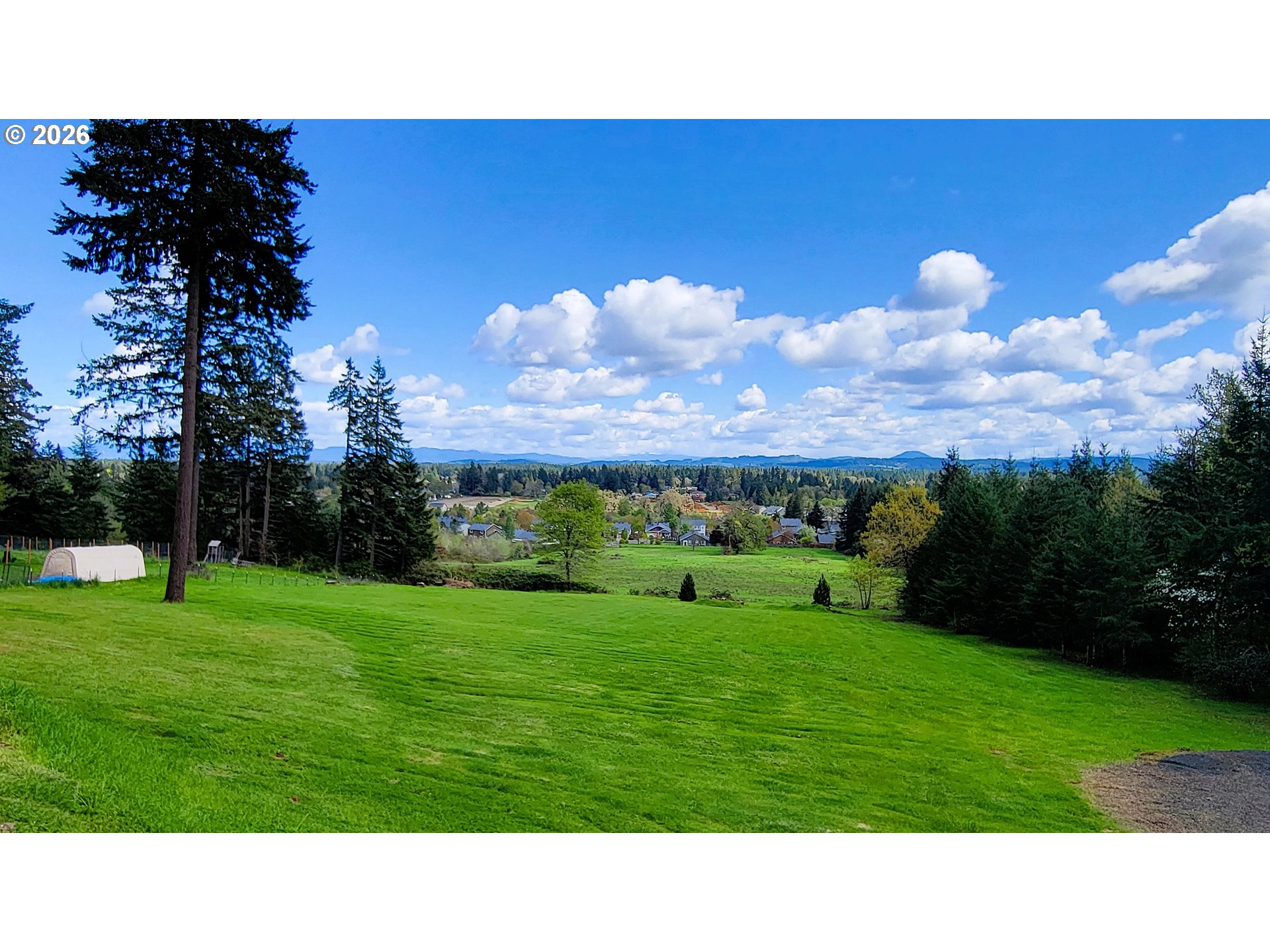 24674 Bolton Hill Road Veneta, OR 97487 - Photo 2 of 35 a open area with green field