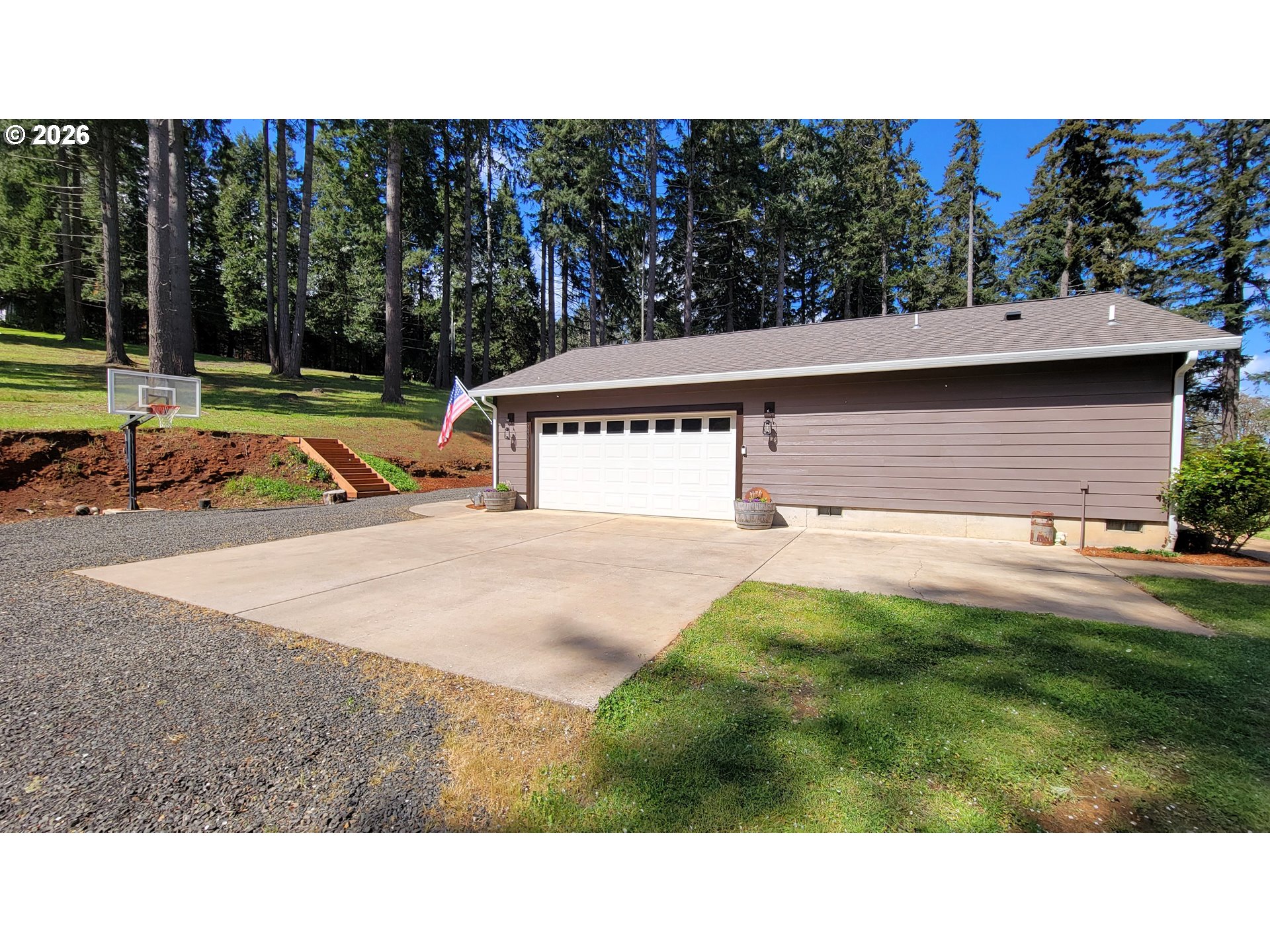 24674 Bolton Hill Road Veneta, OR 97487 - Photo 23 of 35 a view of a swimming pool with a yard